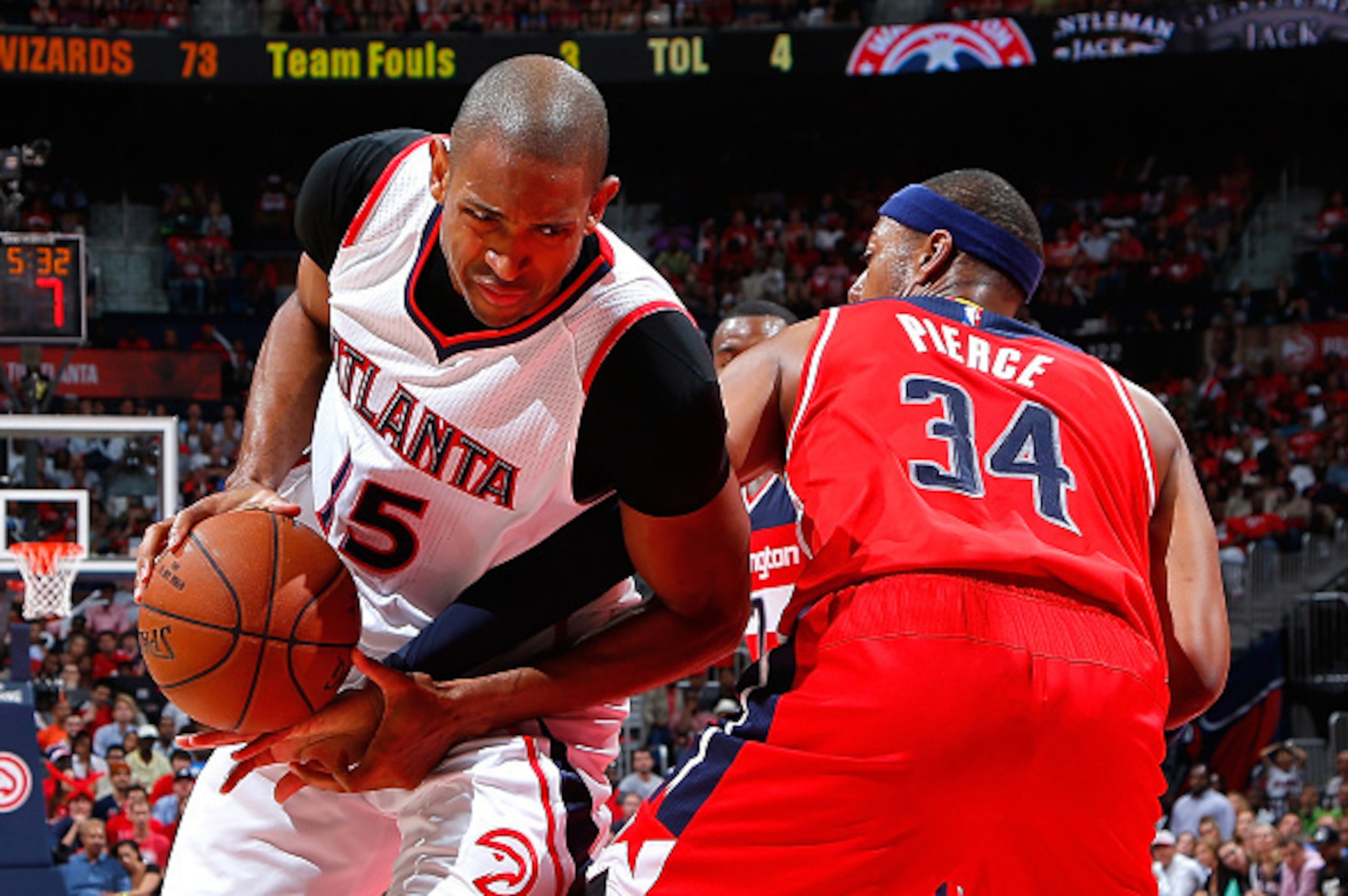 ATLANTA, GA - MAY 13: Al Horford #15 of the Atlanta Hawks draws a foul from Paul Pierce #34 of the Washington Wizards during Game Five of the Eastern Conference Semifinals of the 2015 NBA Playoffs at Philips Arena on May 13, 2015 in Atlanta, Georgia. NO ATLANTA, GA - MAY 13: Al Horford #15 of the Atlanta Hawks draws a foul from Paul Pierce #34 of the Washington Wizards during Game Five of the Eastern Conference Semifinals of the 2015 NBA Playoffs at Philips Arena on May 13, 2015 in Atlanta, Georgia. NO