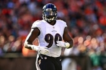 Oct 26, 2014; Cincinnati, OH, USA; 
Baltimore Ravens linebacker Pernell McPhee (90) against the Cincinnati Bengals at Paul Brown Stadium. Bengals defeated the Ravens 27-24. Mandatory Credit: Andrew Weber-USA TODAY Sports