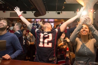OSTON, MA - FEBRUARY 1:  New England Patriots fans cheer after the  Patriots defeated the Seattle Seahawks in Super Bowl XLIX at Jerry Remy's Sports Bar February 1, 2015 in Boston, Massachusetts. (Photo by Scott Eisen/Getty Images)