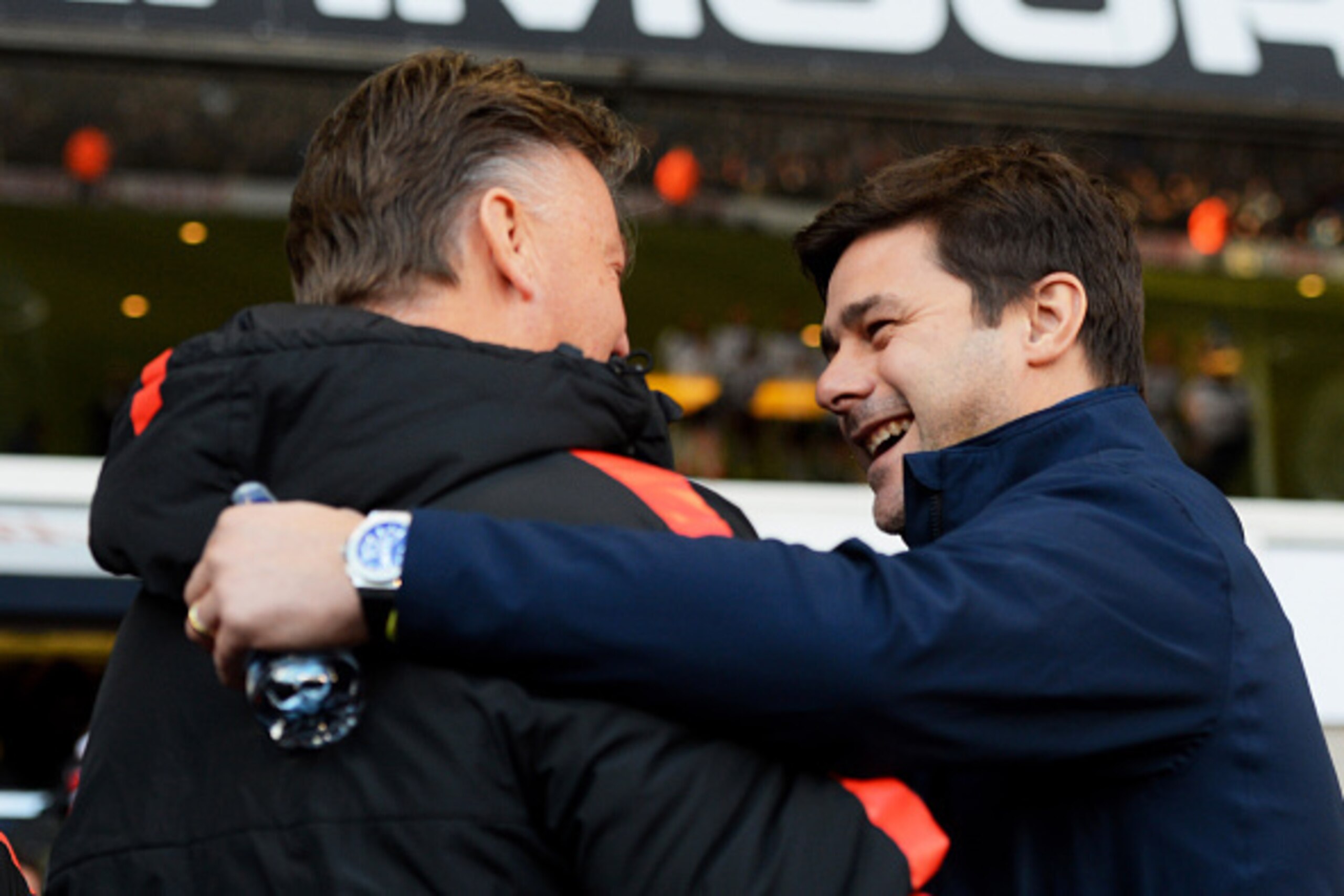 LONDON, ENGLAND - DECEMBER 28:  Manager Louis van Gaal of Manchester United and Manager Mauricio Pochettino of Spurs greet one another prior to kickoff during the Barclays Premier League match between Tottenham Hotspur and Manchester United at White Hart 