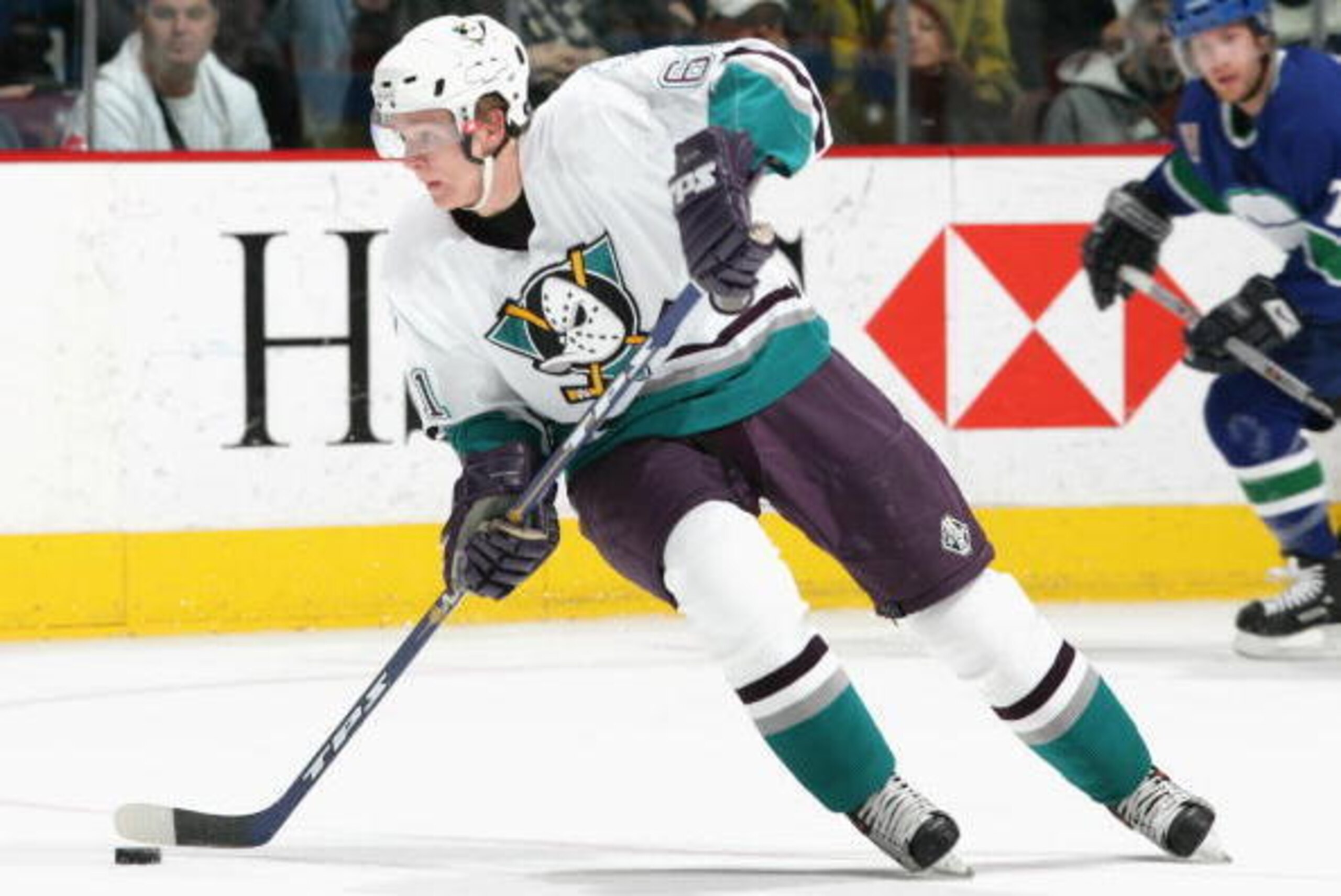 VANCOUVER - APRIL 10: Corey Perry #61 of the Anaheim Mighty Ducks skates with the puck against the Vancouver Canucks during the NHL game at General Motors Place on April 10, 2006 in Vancouver, Canada. Anaheim defeated Vancouver 4-2. (Photo by Jeff Vinni VANCOUVER - APRIL 10: Corey Perry #61 of the Anaheim Mighty Ducks skates with the puck against the Vancouver Canucks during the NHL game at General Motors Place on April 10, 2006 in Vancouver, Canada. Anaheim defeated Vancouver 4-2. (Photo by Jeff Vinni