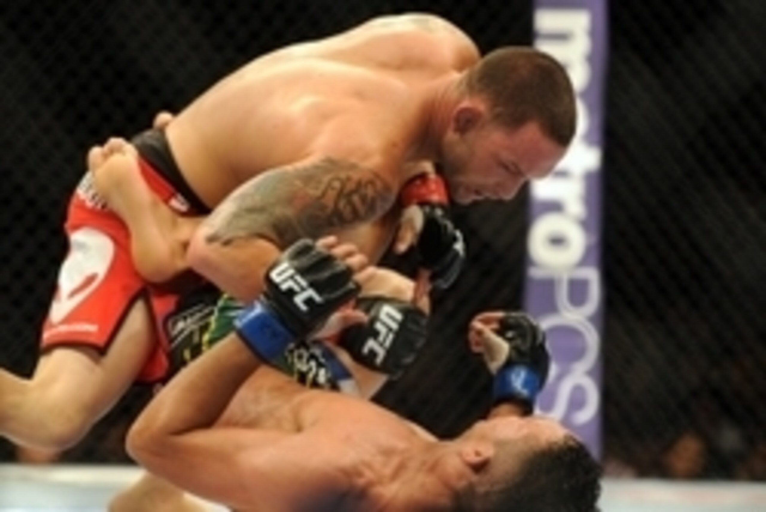 Jul 6, 2013; Las Vegas, NV, USA;  Frankie Edgar and Charles Oliveira during their Featherweight Bout at the MGM Grand Garden Arena. Mandatory Credit: Jayne Kamin-Oncea-USA TODAY Sports