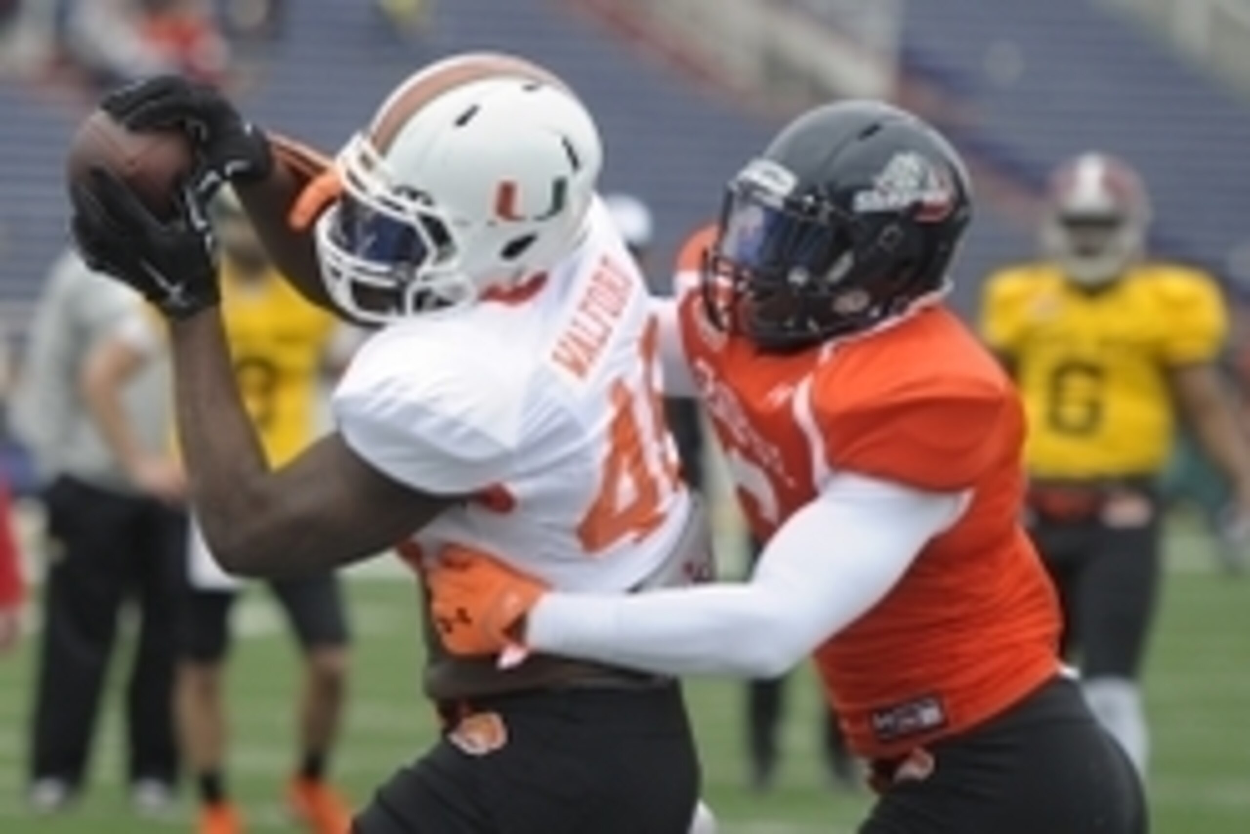 Jan 22, 2015; Mobile, AL, USA; South squad tight end Clive Walford of Miami (46) catches a pass as safety Jaquiski Tartt of Samford (6) defends during Senior Bowl South squad practice at Ladd-Peebles Stadium. Mandatory Credit: Glenn Andrews-USA TODAY Spor Jan 22, 2015; Mobile, AL, USA; South squad tight end Clive Walford of Miami (46) catches a pass as safety Jaquiski Tartt of Samford (6) defends during Senior Bowl South squad practice at Ladd-Peebles Stadium. Mandatory Credit: Glenn Andrews-USA TODAY Spor