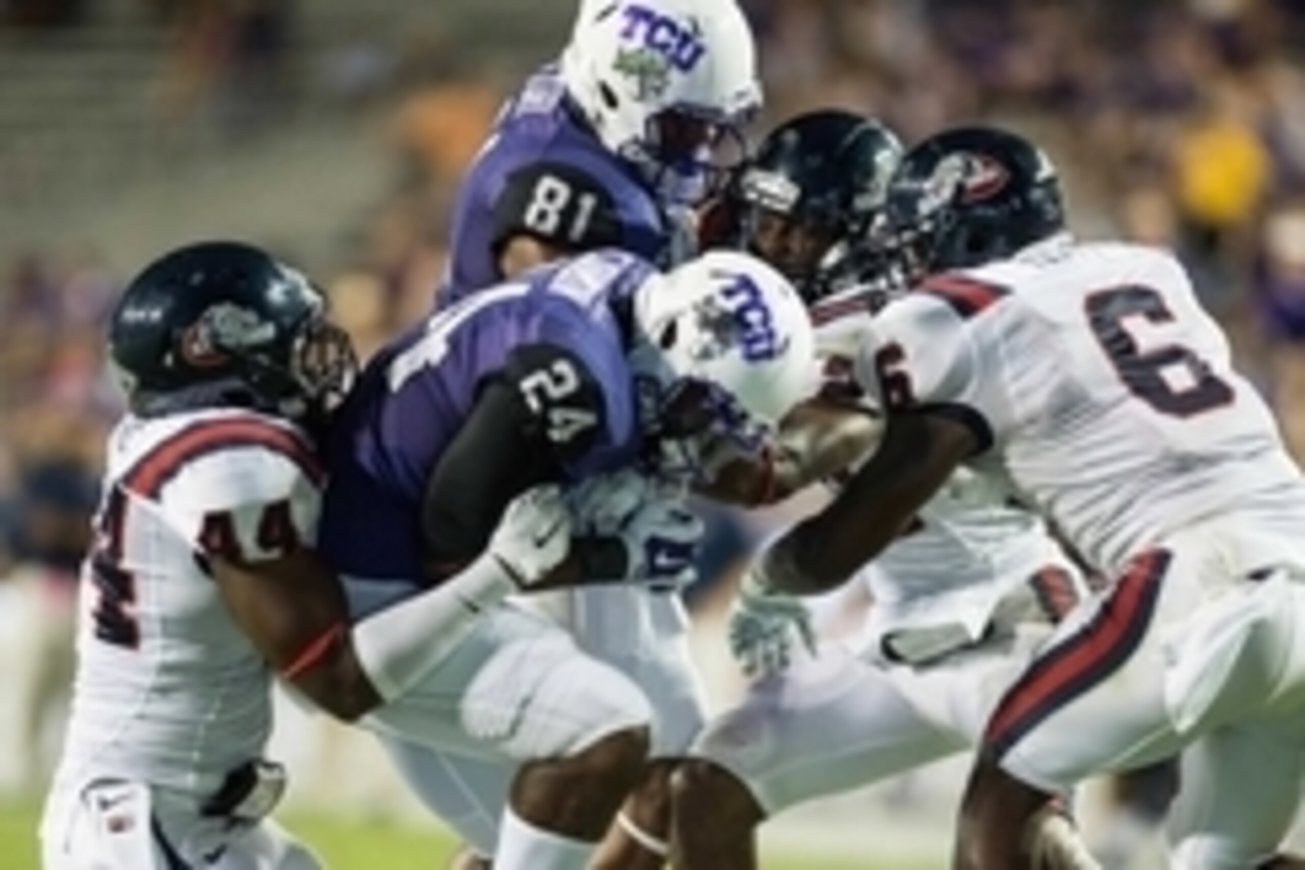 Aug 30, 2014; Fort Worth, TX, USA; Samford Bulldogs linebacker Deion Pierre (44) and safety Jaquiski Tartt (6) tackle TCU Horned Frogs running back Trevorris Johnson (24) during the game at Amon G. Carter Stadium. The Horned Frogs defeated the Bulldogs 48 Aug 30, 2014; Fort Worth, TX, USA; Samford Bulldogs linebacker Deion Pierre (44) and safety Jaquiski Tartt (6) tackle TCU Horned Frogs running back Trevorris Johnson (24) during the game at Amon G. Carter Stadium. The Horned Frogs defeated the Bulldogs 48