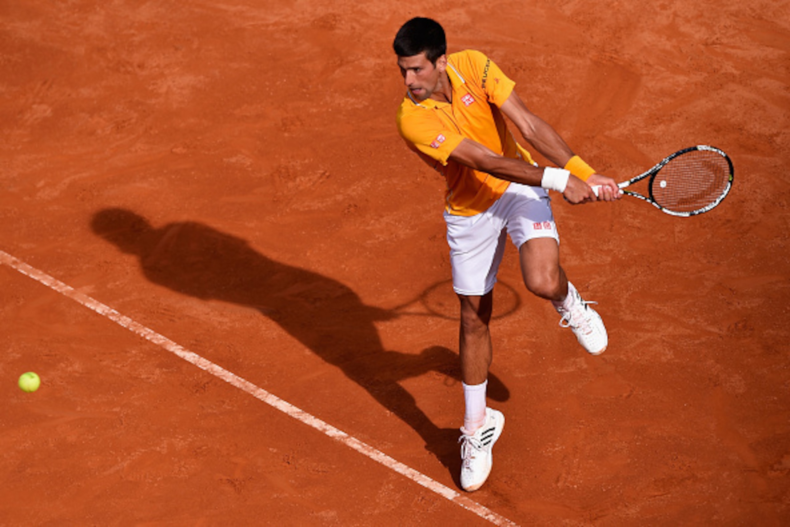 ROME, ITALY - MAY 12:  Novak Djkovic of Serbia in action during his Second Round match against Nicolas Almagro of Spain on Day Three of The Internazionali BNL d'Italia 2015 at the Foro Italico on May 12, 2015 in Rome, Italy.  (Photo by Mike Hewitt/Getty I