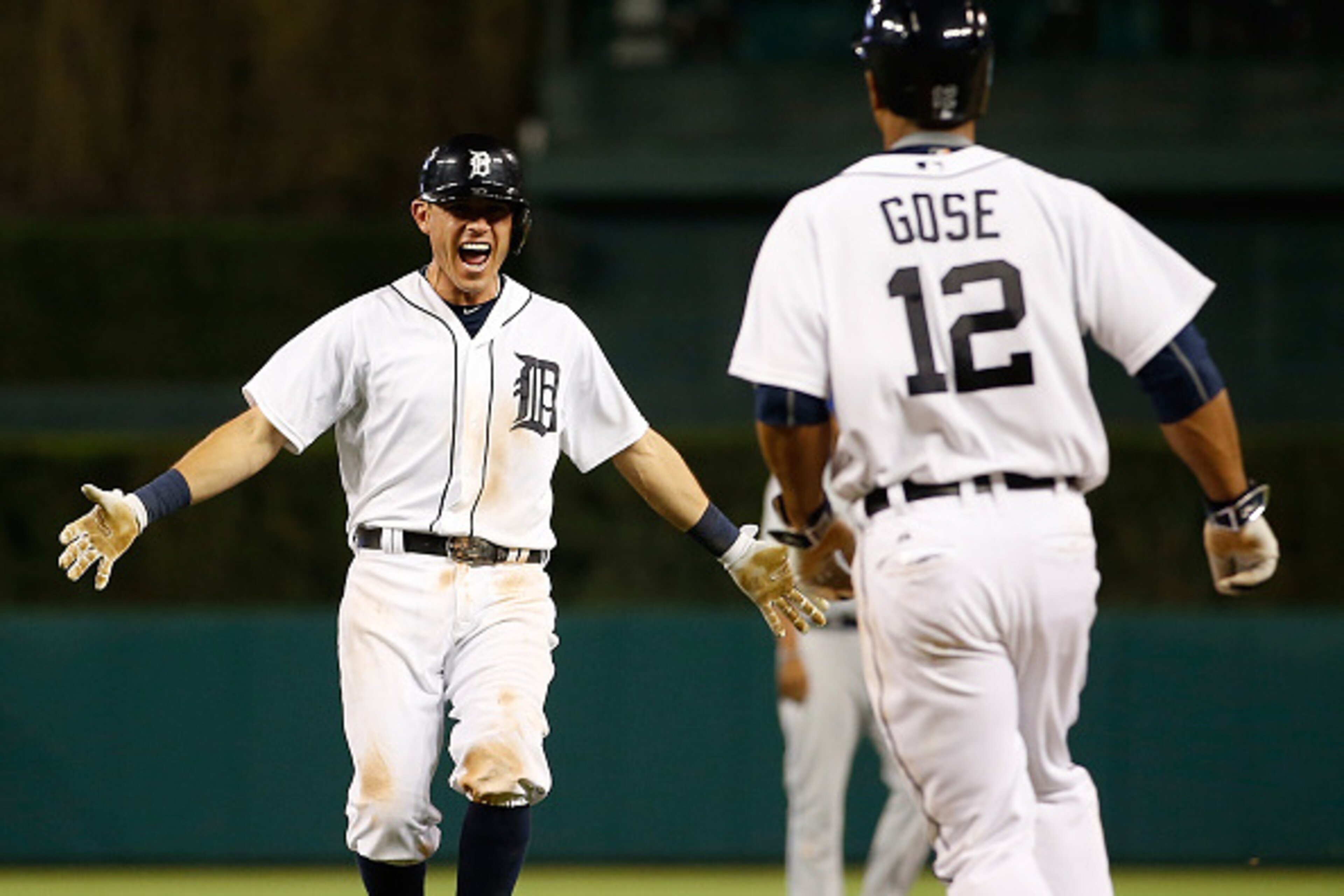 DETROIT, MI - MAY 08:  Ian Kinsler #3 of the Detroit Tigers celebrates with Anthony Gose #12 after beating the Kansas City Royals in the bottom of the ninth inning at Comerica Park on May 8, 2015 in Detroit, Michigan.  (Photo by Gregory Shamus/Getty Image