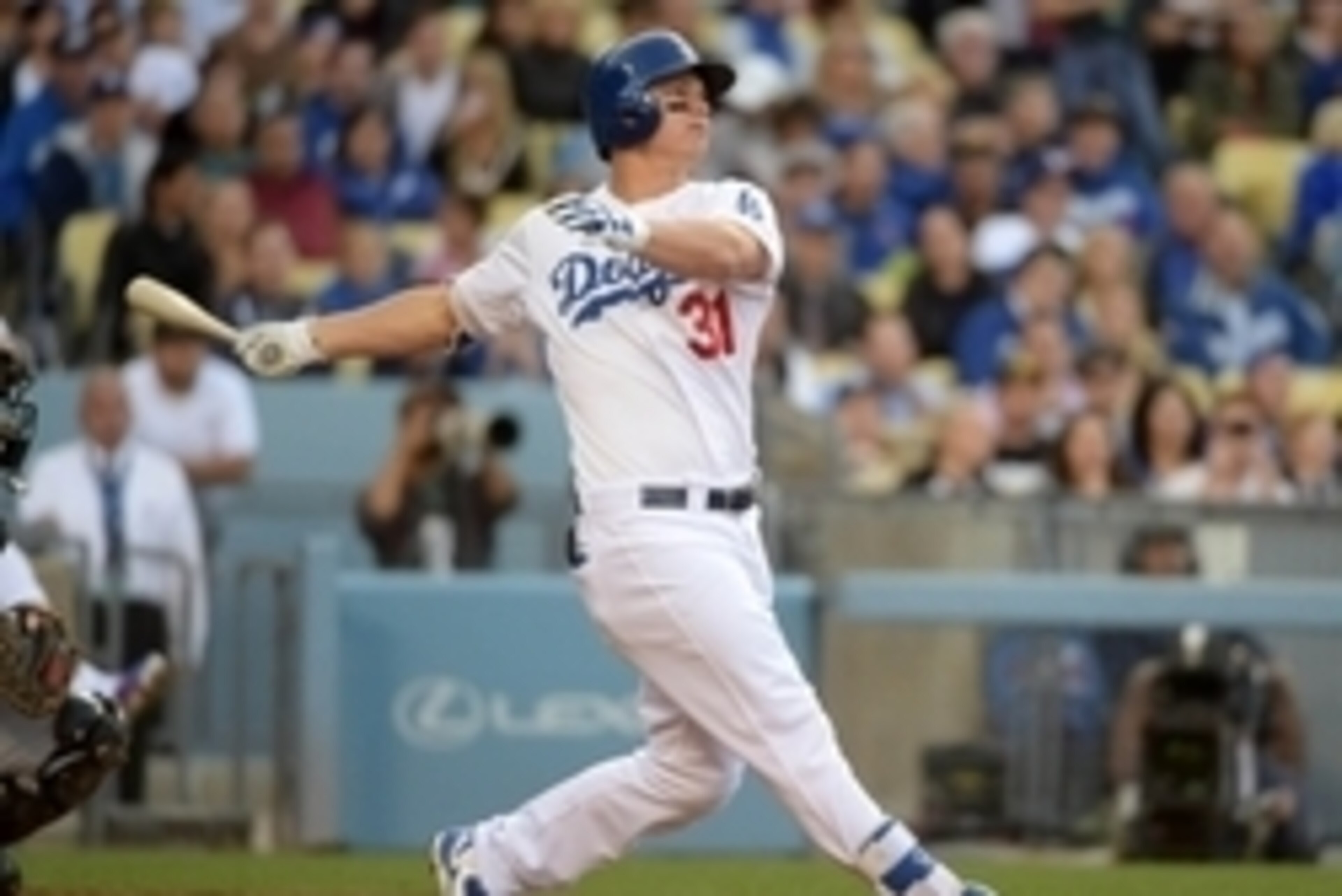 May 13, 2015; Los Angeles, CA, USA; Los Angeles Dodgers center fielder Joc Pederson (31) hits a two-run home run in the sixth inning against the Miami Marlins at Dodger Stadium. The Marlins defeated the Dodgers 5-4. Mandatory Credit: Kirby Lee-USA TODAY S