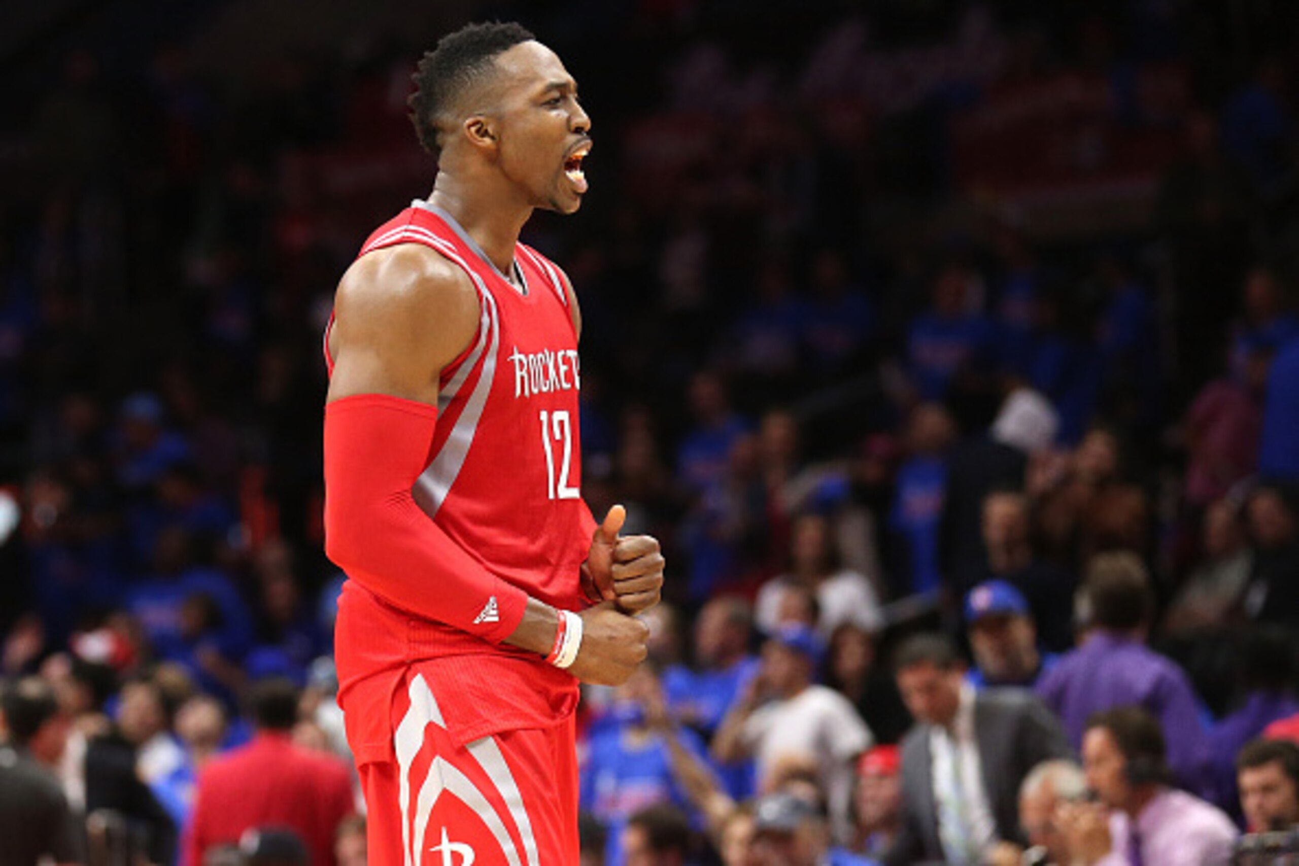 LOS ANGELES, CA - MAY 14: Dwight Howard #12 of he Houston Rockets celebrates after defeating the Los Angeles Clippers during Game Six of the Western Conference semifinals of the 2015 NBA Playoffs at Staples Center on May 14, 2015 in Los Angeles, Californi LOS ANGELES, CA - MAY 14: Dwight Howard #12 of he Houston Rockets celebrates after defeating the Los Angeles Clippers during Game Six of the Western Conference semifinals of the 2015 NBA Playoffs at Staples Center on May 14, 2015 in Los Angeles, Californi