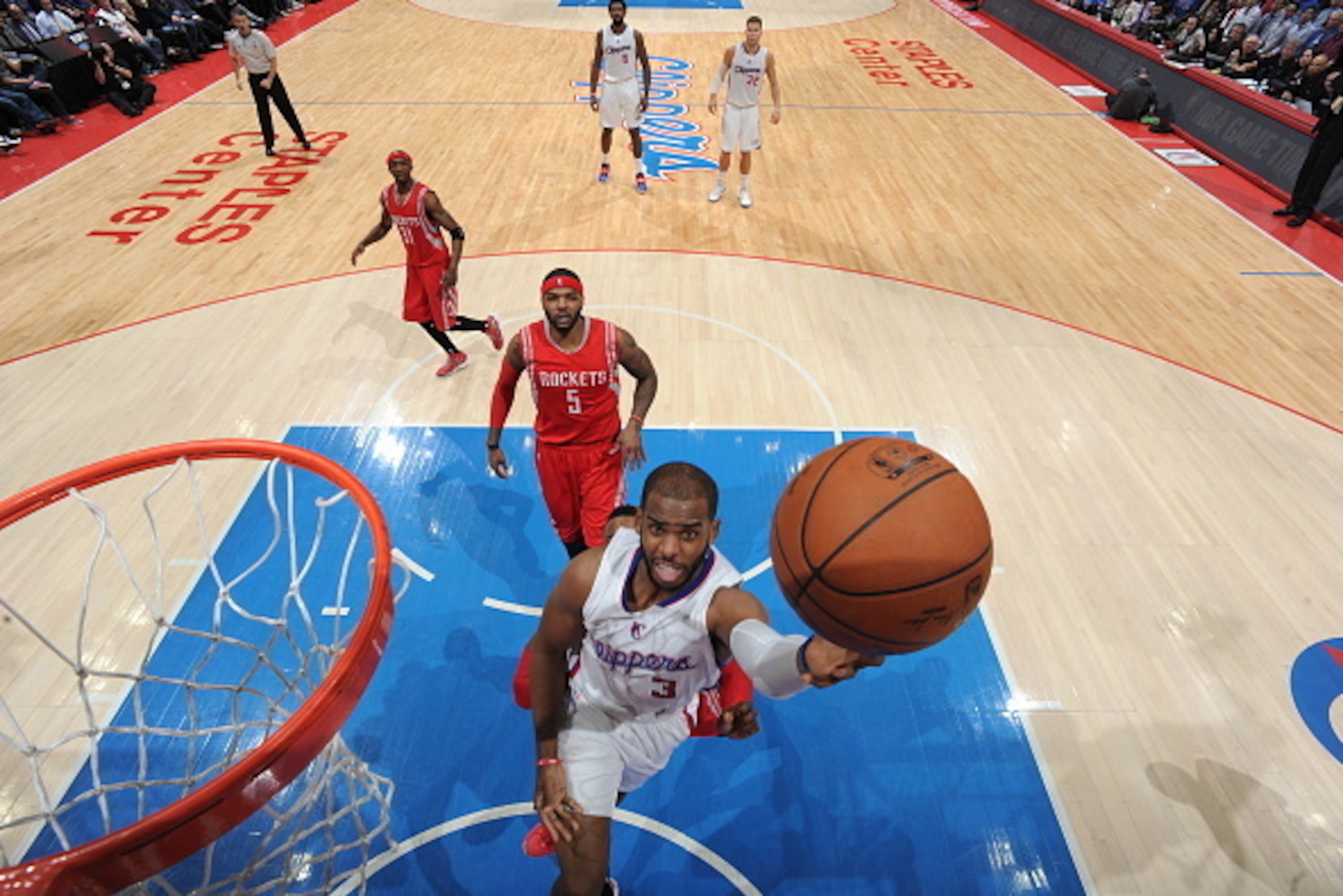 LOS ANGELES, CA - MAY 14: Chris Paul #3 of the Los Angeles Clippers goes to the basket against the Houston Rockets in Game Six of the Western Conference Semifinals during the 2015 NBA Playoffs on May 14, 2015 at Staples Center in Los Angeles, California. LOS ANGELES, CA - MAY 14: Chris Paul #3 of the Los Angeles Clippers goes to the basket against the Houston Rockets in Game Six of the Western Conference Semifinals during the 2015 NBA Playoffs on May 14, 2015 at Staples Center in Los Angeles, California.