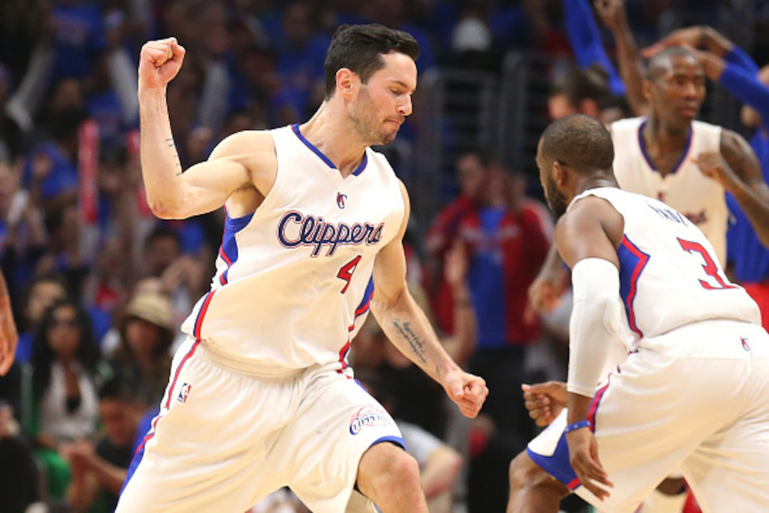 LOS ANGELES, CA - MAY 14: J.J. Redick #4 of the Los Angeles Clippers celebrates after making a three point shot against the Houston Rockets during Game Six of the Western Conference semifinals of the 2015 NBA Playoffs at Staples Center on May 14, 2015 in LOS ANGELES, CA - MAY 14: J.J. Redick #4 of the Los Angeles Clippers celebrates after making a three point shot against the Houston Rockets during Game Six of the Western Conference semifinals of the 2015 NBA Playoffs at Staples Center on May 14, 2015 in