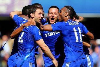 LONDON, ENGLAND - MAY 03:  John Terry (C) and Branislav Ivanovic (L) and Didier Drogba of Chelsea (R) celebrate winning the Premier League title after the Barclays Premier League match between Chelsea and Crystal Palace at Stamford Bridge on May 3, 2015 i