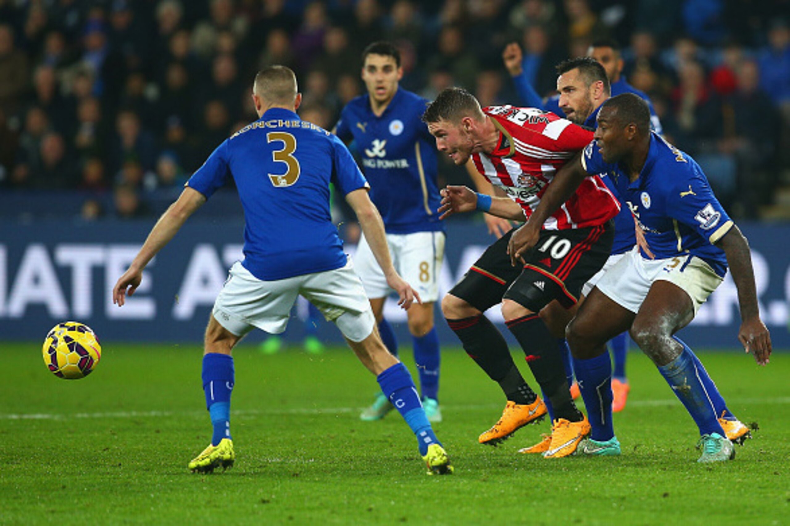 LEICESTER, ENGLAND - NOVEMBER 22:  Connor Wickham of Sunderland and Wes Morgan of Leicester City battle for the ball during the Barclays Premier League match between Leicester City and Sunderland at The King Power Stadium on November 22, 2014 in Leicester
