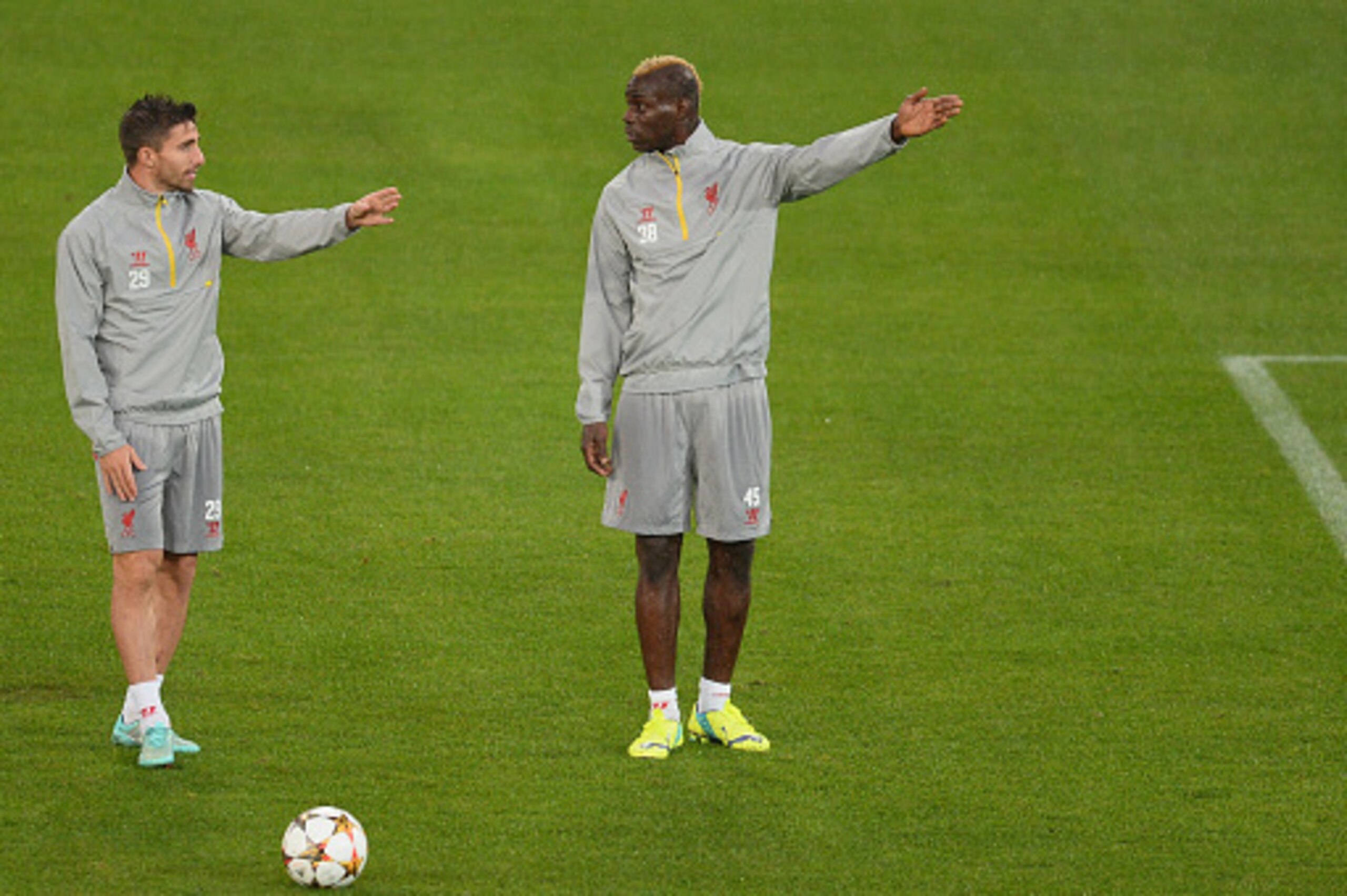 BASEL, SWITZERLAND - SEPTEMBER 30:  Mario Balotelli and Fabio Borini of Liverpool warms up during a Liverpool training and press conference at St. Jakob-Park stadium on September 30, 2014 in Basel, Switzerland.  (Photo by Jamie McDonald/Getty Images)
