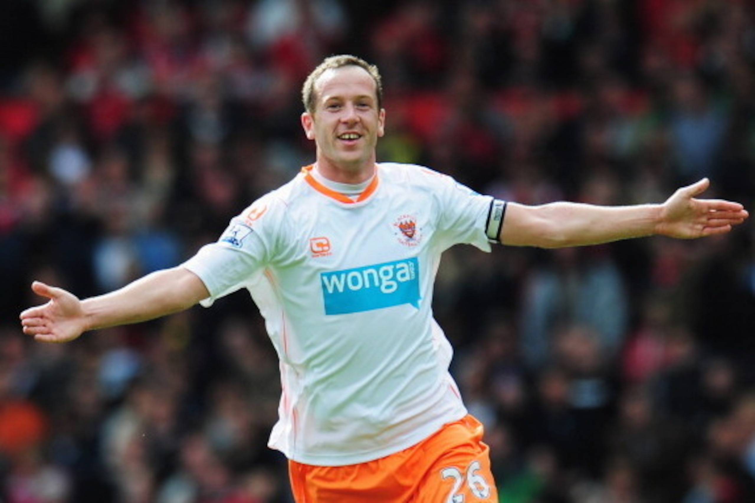 MANCHESTER, ENGLAND - MAY 22:  Charlie Adam of Blackpool celebrates as scores their first goal from a free kick during the Barclays Premier League match between Manchester United and Blackpool at Old Trafford on May 22, 2011 in Manchester, England.  (Phot