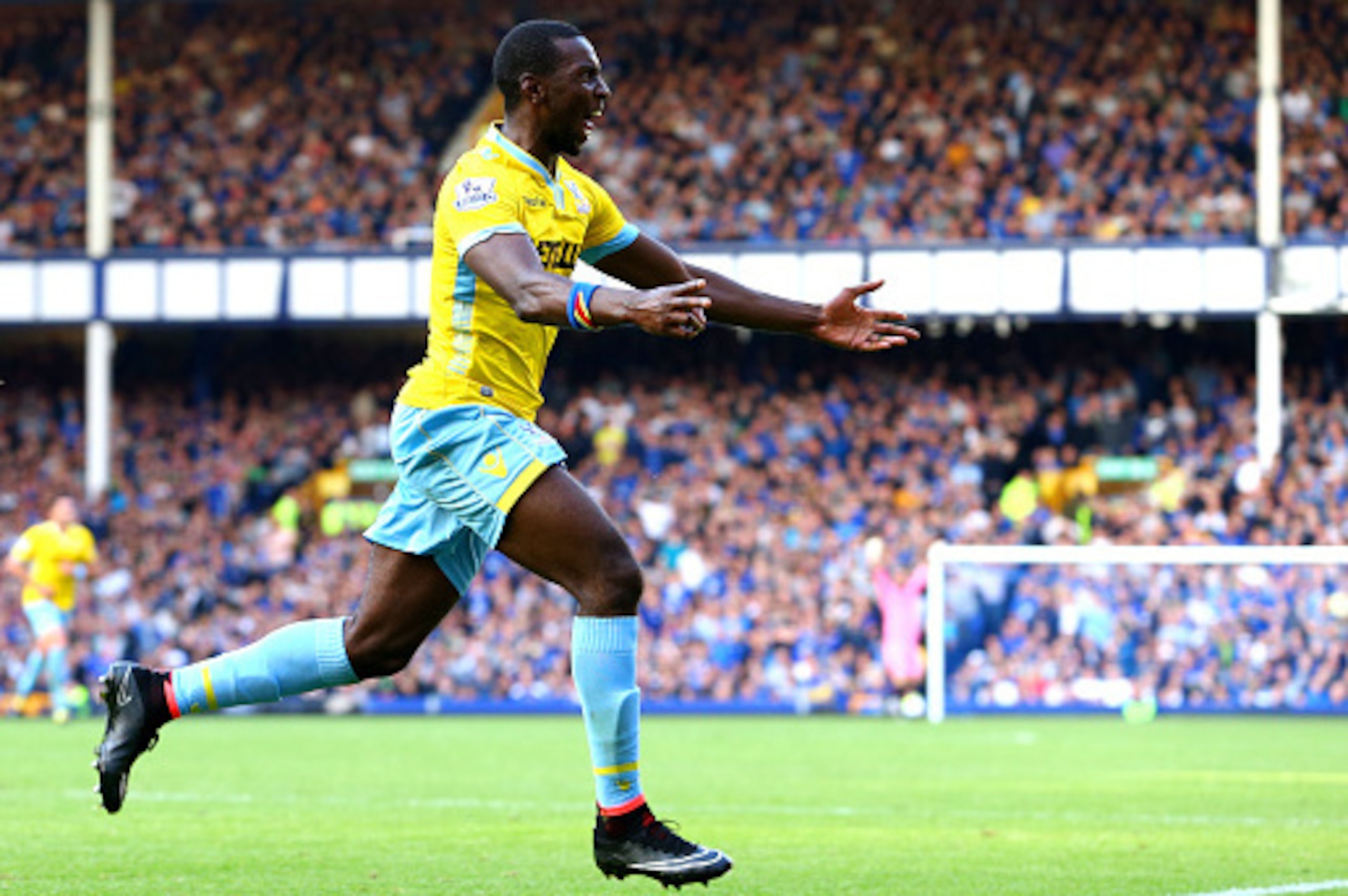 LIVERPOOL, ENGLAND - SEPTEMBER 21:  Yannick Bolasie of Crystal Palace celebrates after scoring his team's third goal during the Barclays Premier League match between Everton and Crystal Palace at Goodison Park on September 21, 2014 in Liverpool, England. 