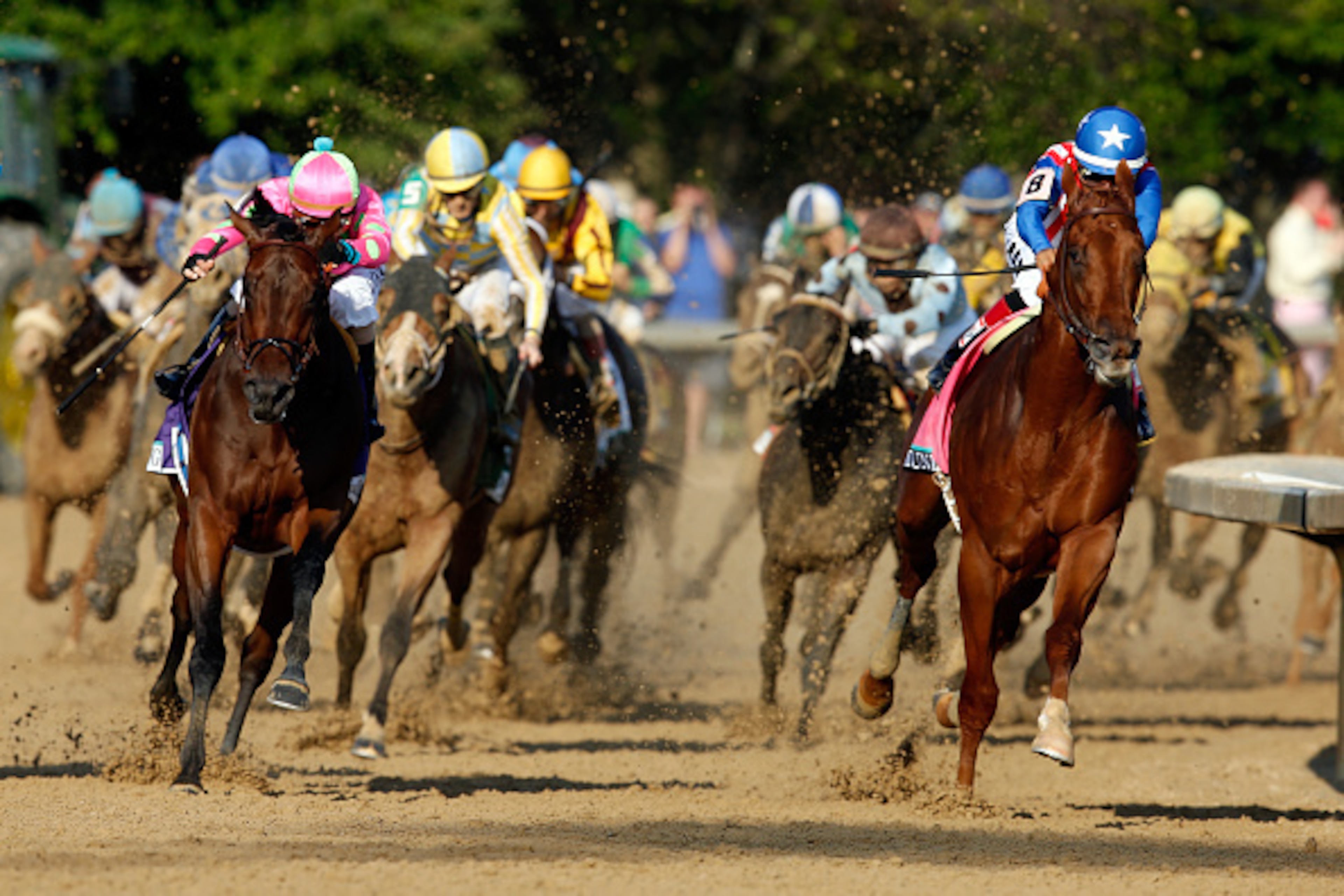 LOUISVILLE, KY - MAY 02:  Firing Line #10, ridden by Gary Stevens, races Dortmund #8, ridden by Martin Garcia, out of the forth turn during the 141st running of the Kentucky Derby at Churchill Downs on May 2, 2015 in Louisville, Kentucky.  (Photo by Andy 
