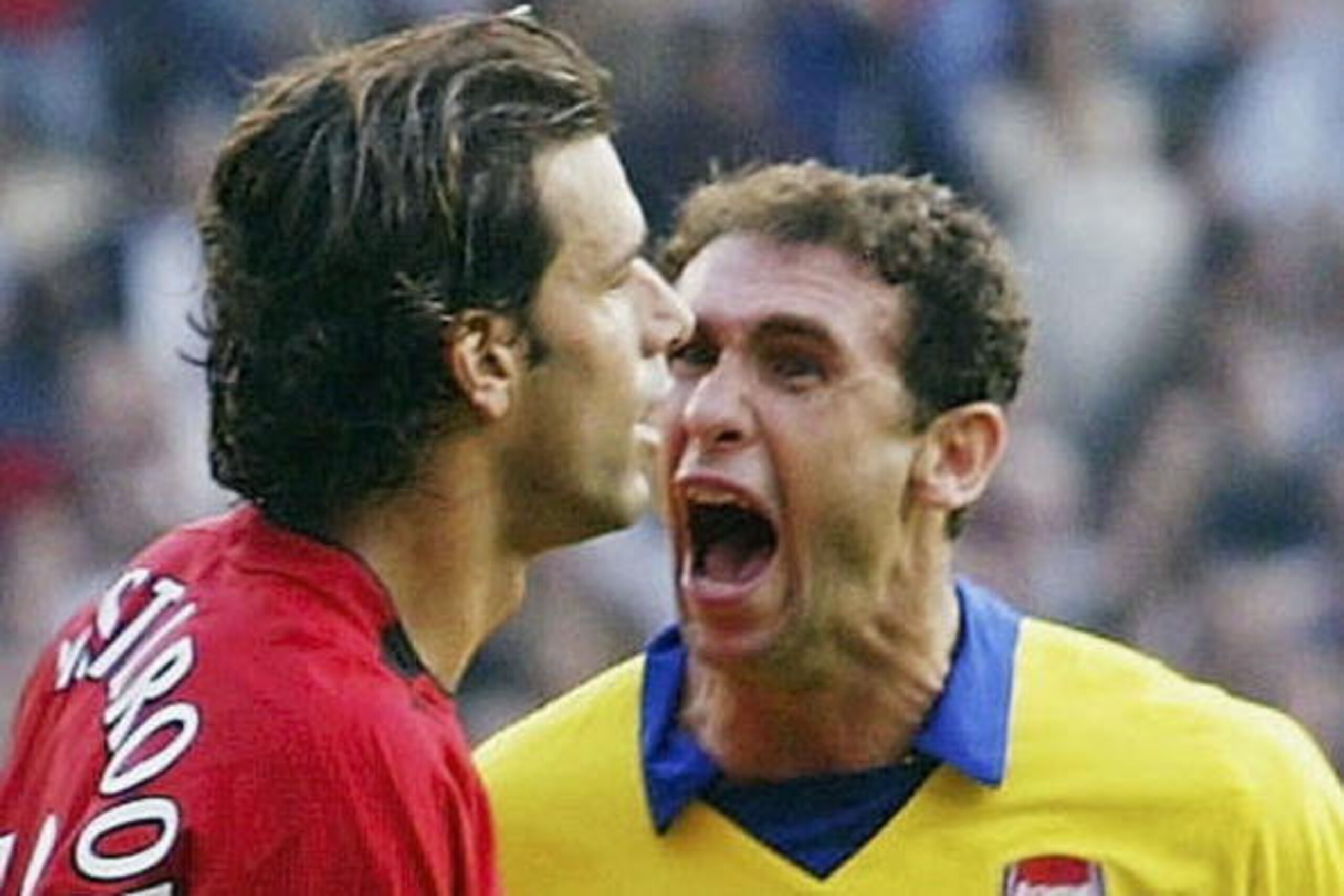MANCHESTER, ENGLAND - SEPTEMBER 21:  Martin Keown of Arsenal shows his feelings at Ruud Van Nistelrooy of Man Utd after Van Nistelrooy missed his penalty during the FA Barclaycard Premiership match between Manchester United and Arsenal at Old Trafford on 