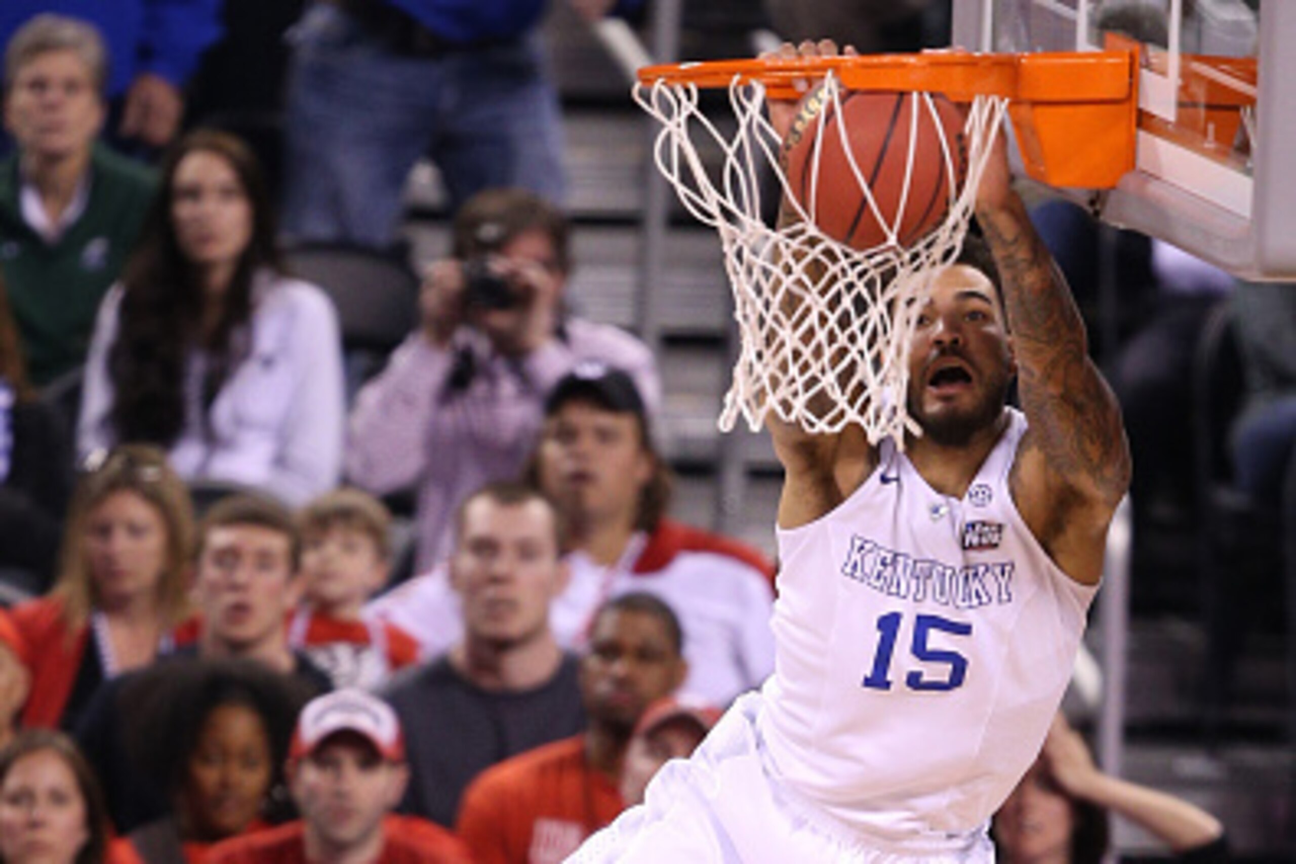 INDIANAPOLIS, IN - APRIL 04:  Willie Cauley-Stein #15 of the Kentucky Wildcats goes up for a dunk against Sam Dekker #15 of the Wisconsin Badgers in the first half during the NCAA Men's Final Four Semifinal at Lucas Oil Stadium on April 4, 2015 in Indiana