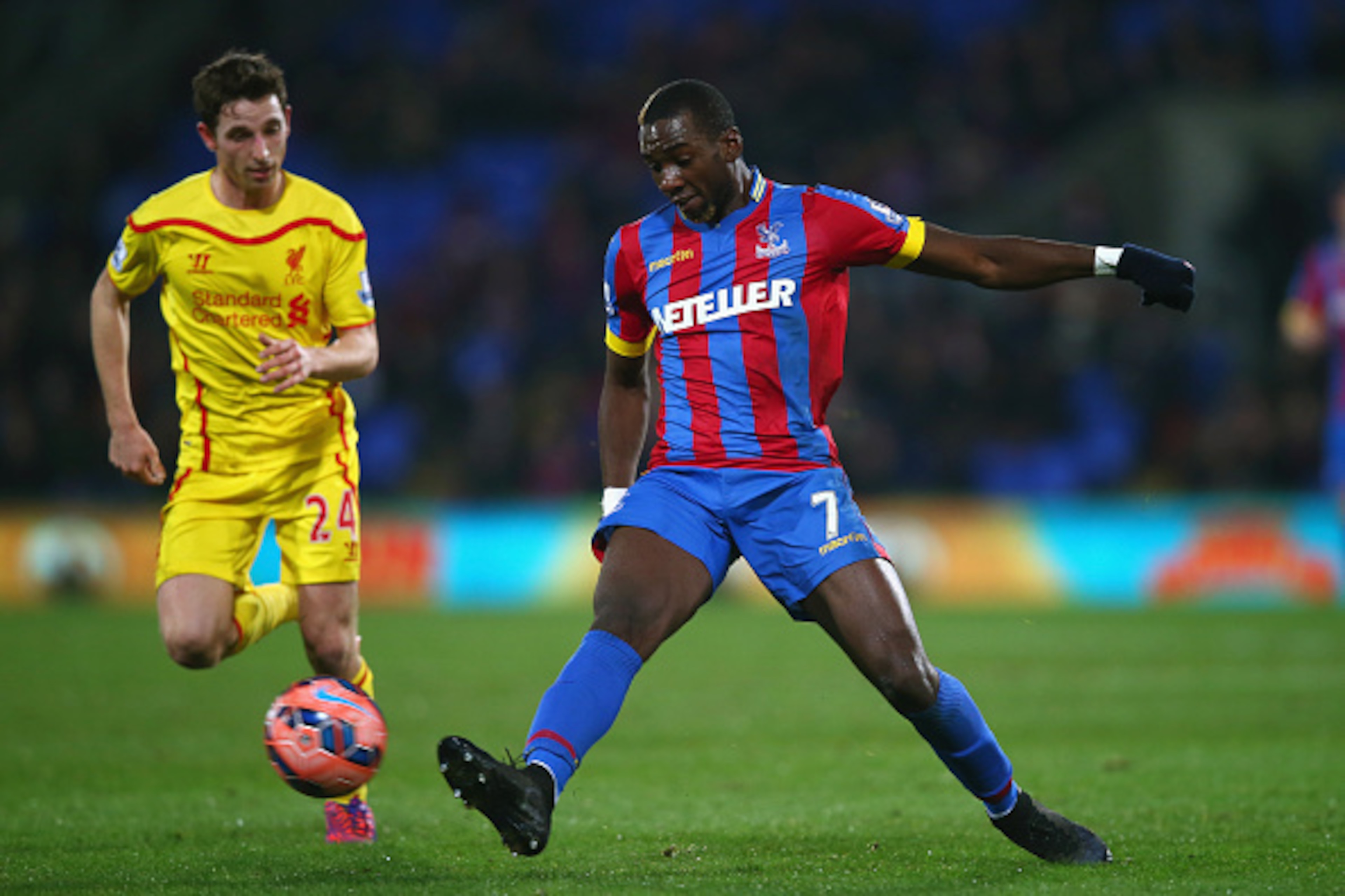 LONDON, ENGLAND - FEBRUARY 14: Joe Allen of Liverpool marshalls Yannick Bolasie of Crystal Palace during the FA Cup fifth round match between Crystal Palace and Liverpool at Selhurst Park on February 14, 2015 in London, England. (Photo by Clive Rose/Get LONDON, ENGLAND - FEBRUARY 14: Joe Allen of Liverpool marshalls Yannick Bolasie of Crystal Palace during the FA Cup fifth round match between Crystal Palace and Liverpool at Selhurst Park on February 14, 2015 in London, England. (Photo by Clive Rose/Get