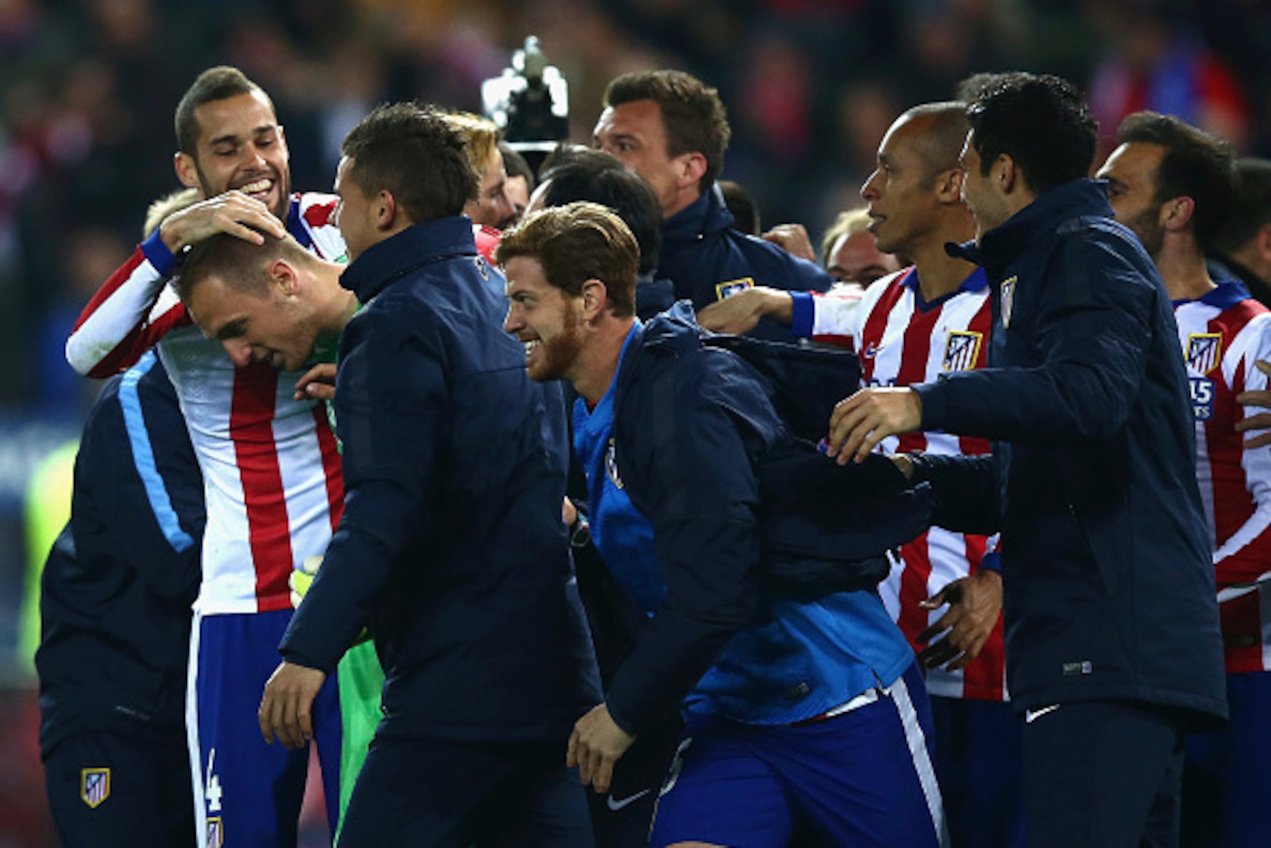 MADRID, SPAIN - MARCH 17: Jan Oblak of Atletico Madrid is mobbed by team mates after the penalty shoot out during the UEFA Champions League round of 16 match between Club Atletico de Madrid and Bayer 04 Leverkusen at Vicente Calderon Stadium on March 17, MADRID, SPAIN - MARCH 17: Jan Oblak of Atletico Madrid is mobbed by team mates after the penalty shoot out during the UEFA Champions League round of 16 match between Club Atletico de Madrid and Bayer 04 Leverkusen at Vicente Calderon Stadium on March 17,