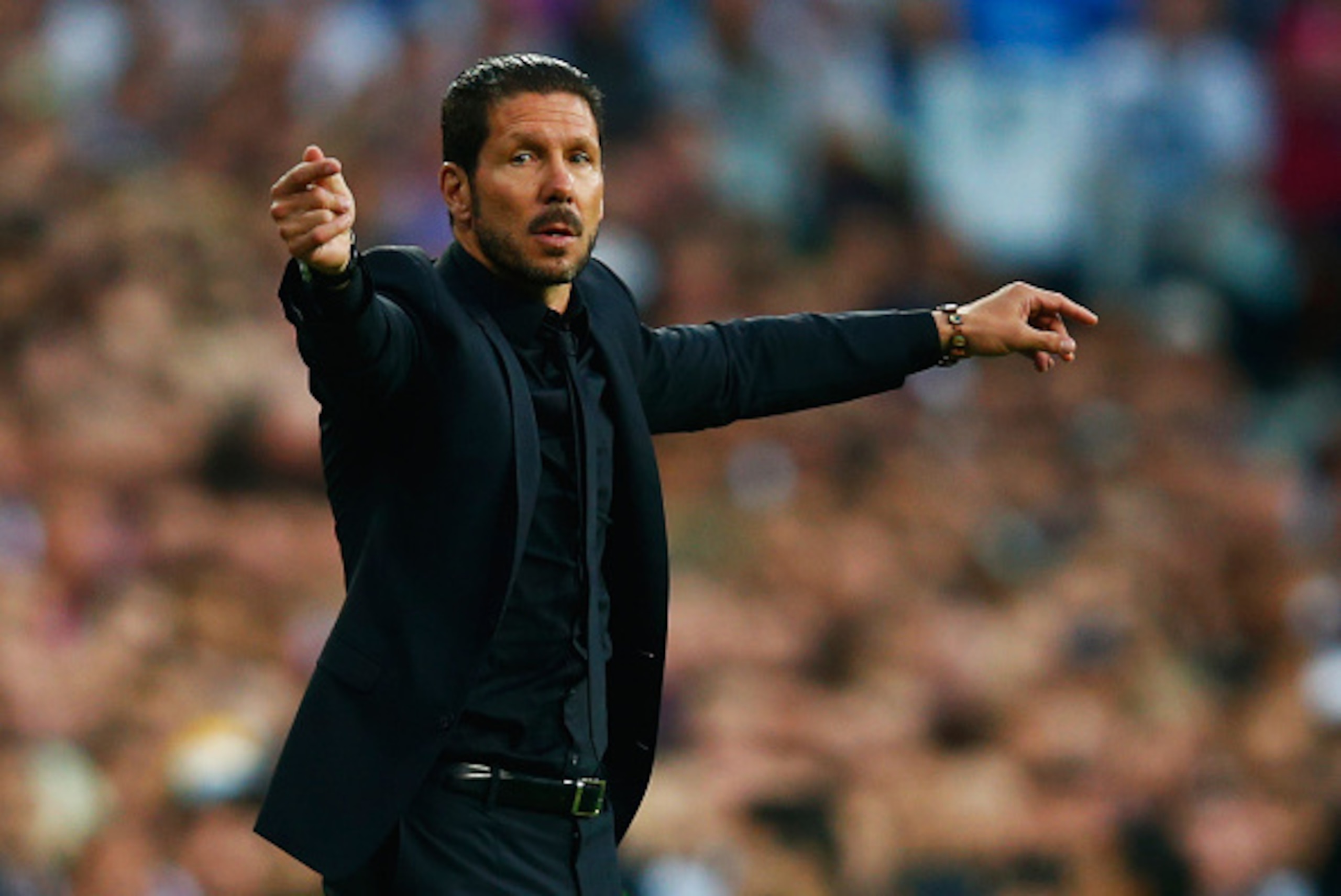 MADRID, SPAIN - APRIL 22: Diego Simeone head coach of Atletico Madrid signals during the UEFA Champions League quarter-final second leg match between Real Madrid CF and Club Atletico de Madrid at Bernabeu on April 22, 2015 in Madrid, Spain. (Photo by Cl MADRID, SPAIN - APRIL 22: Diego Simeone head coach of Atletico Madrid signals during the UEFA Champions League quarter-final second leg match between Real Madrid CF and Club Atletico de Madrid at Bernabeu on April 22, 2015 in Madrid, Spain. (Photo by Cl