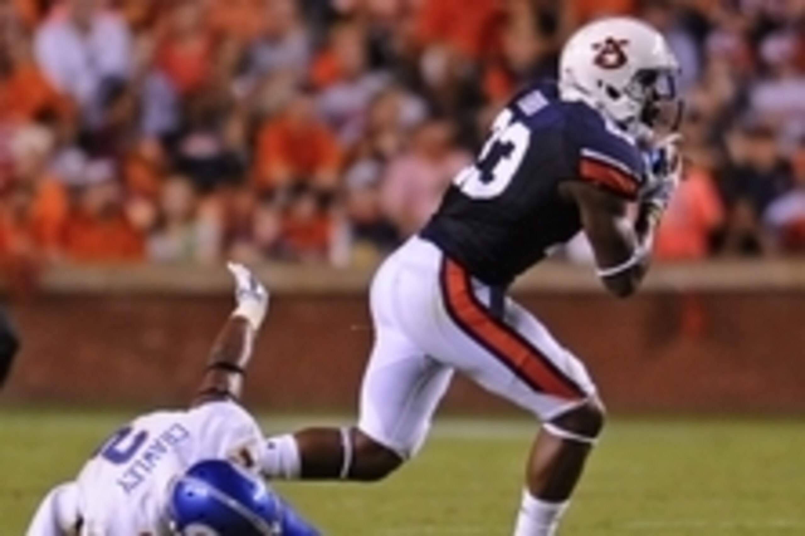 Sep 6, 2014; Auburn, AL, USA; Auburn Tigers defensive back Johnathan Ford (23) recovers a fumble by San Jose State Spartans wide receiver Tim Crawley (2) during the second quarter at Jordan Hare Stadium. Mandatory Credit: Shanna Lockwood-USA TODAY Sports