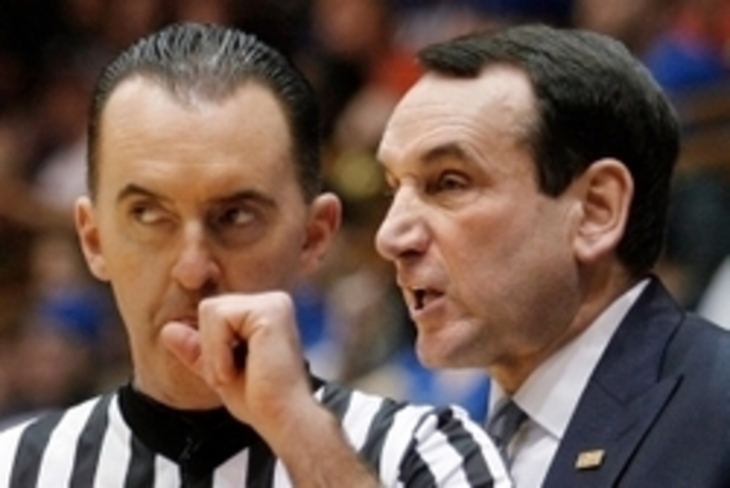 Feb 28, 2015; Durham, NC, USA; Duke Blue Devils head coach Mike Krzyzewski talks to official Roger Ayers in their game against the Syracuse Orange at Cameron Indoor Stadium. Mandatory Credit: Mark Dolejs-USA TODAY Sports