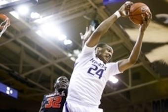 Jan 15, 2015; Seattle, WA, USA; Washington Huskies center Robert Upshaw (24) rebounds against Oregon State Beavers forward Jamal Reid (32) during the first half at Alaska Airlines Arena. Mandatory Credit: Joe Nicholson-USA TODAY Sports