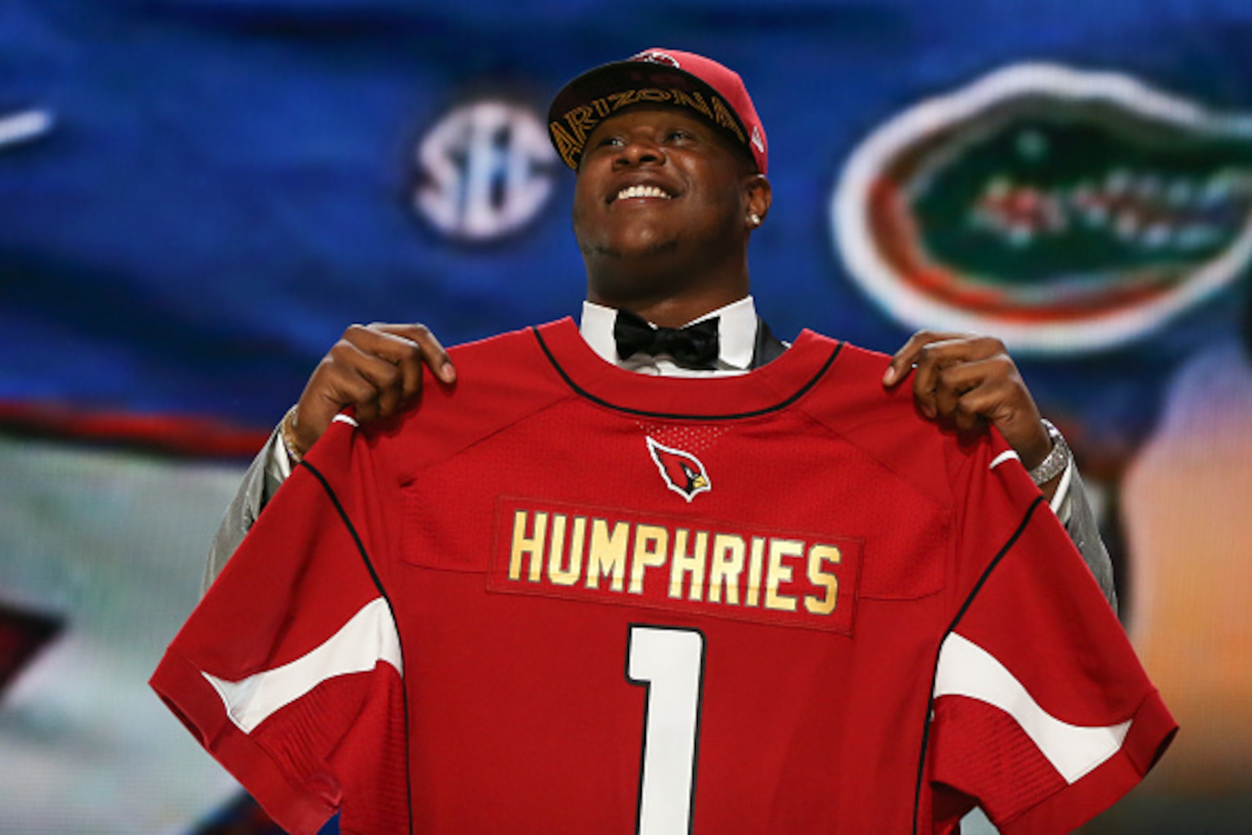 CHICAGO, IL - APRIL 30:  D.J. Humphries of the Florida Gators holds up a jersey after being picked #24 overall by the Arizona Cardinals during the first round of the 2015 NFL Draft at the Auditorium Theatre of Roosevelt University on April 30, 2015 in Chi