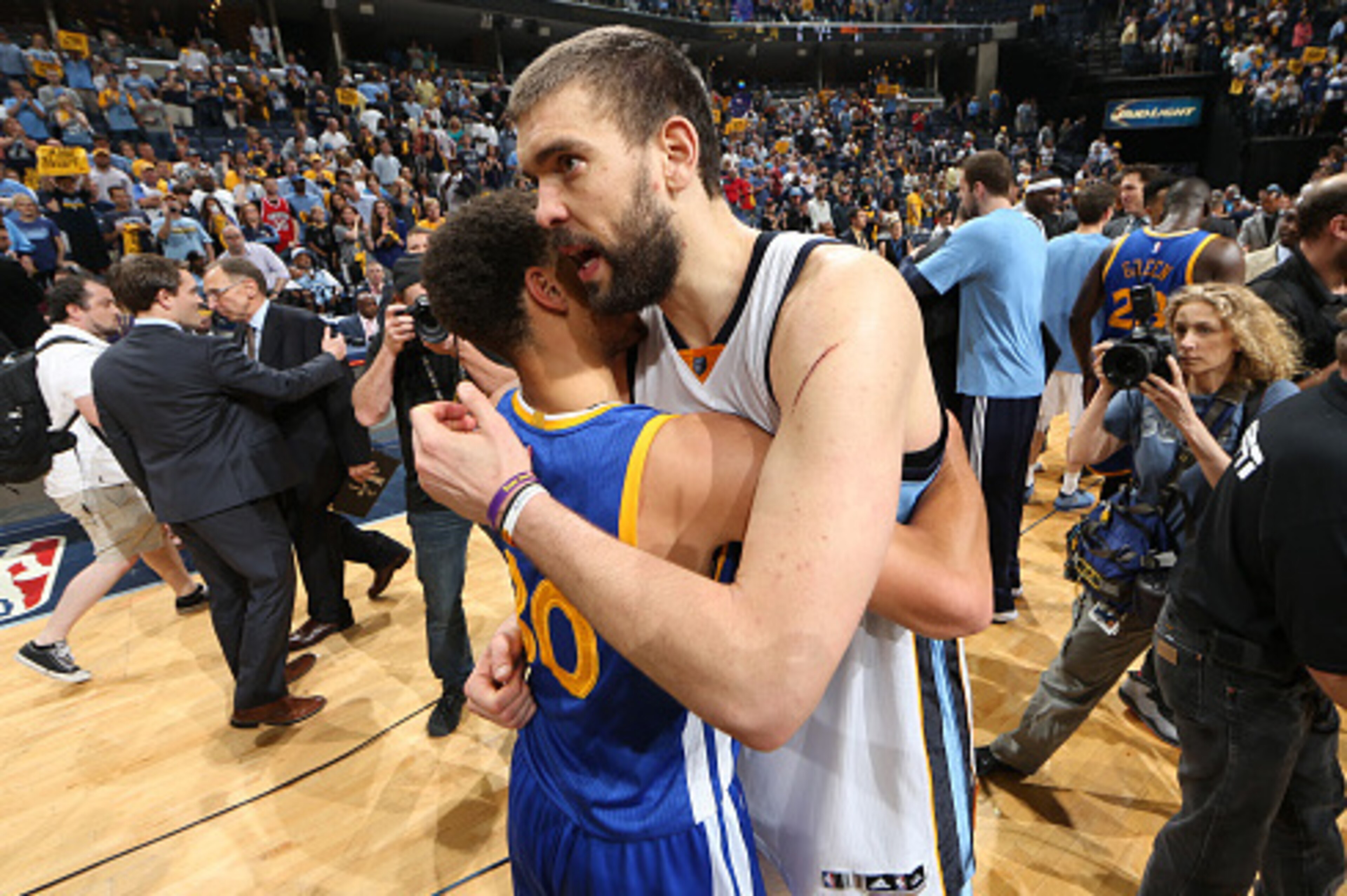 MEMPHIS, TN - MAY 15: Stephen Curry #30 of the Golden State Warriors and Marc Gasol #33 of the Memphis Grizzlies hug after Game Six of the Western Conference Semifinals of the NBA Playoffs at FedExForum on May 15, 2015 in Memphis, Tennessee. NOTE TO USER: