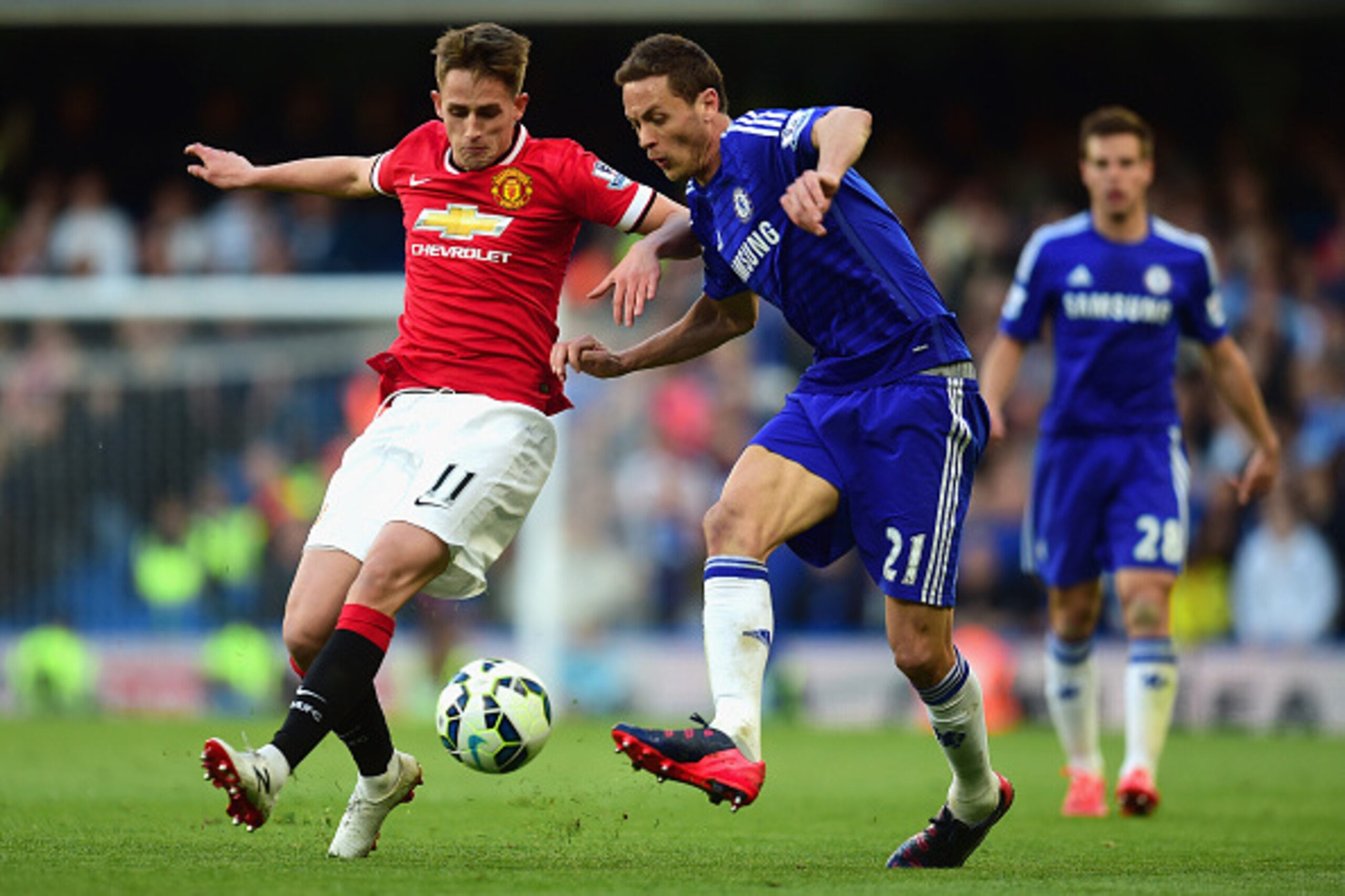 LONDON, ENGLAND - APRIL 18: Adnan Januzaj of Manchester United and Nemanja Matic of Chelsea compete for the ball during the Barclays Premier League match between Chelsea and Manchester United at Stamford Bridge on April 18, 2015 in London, England.  (Phot