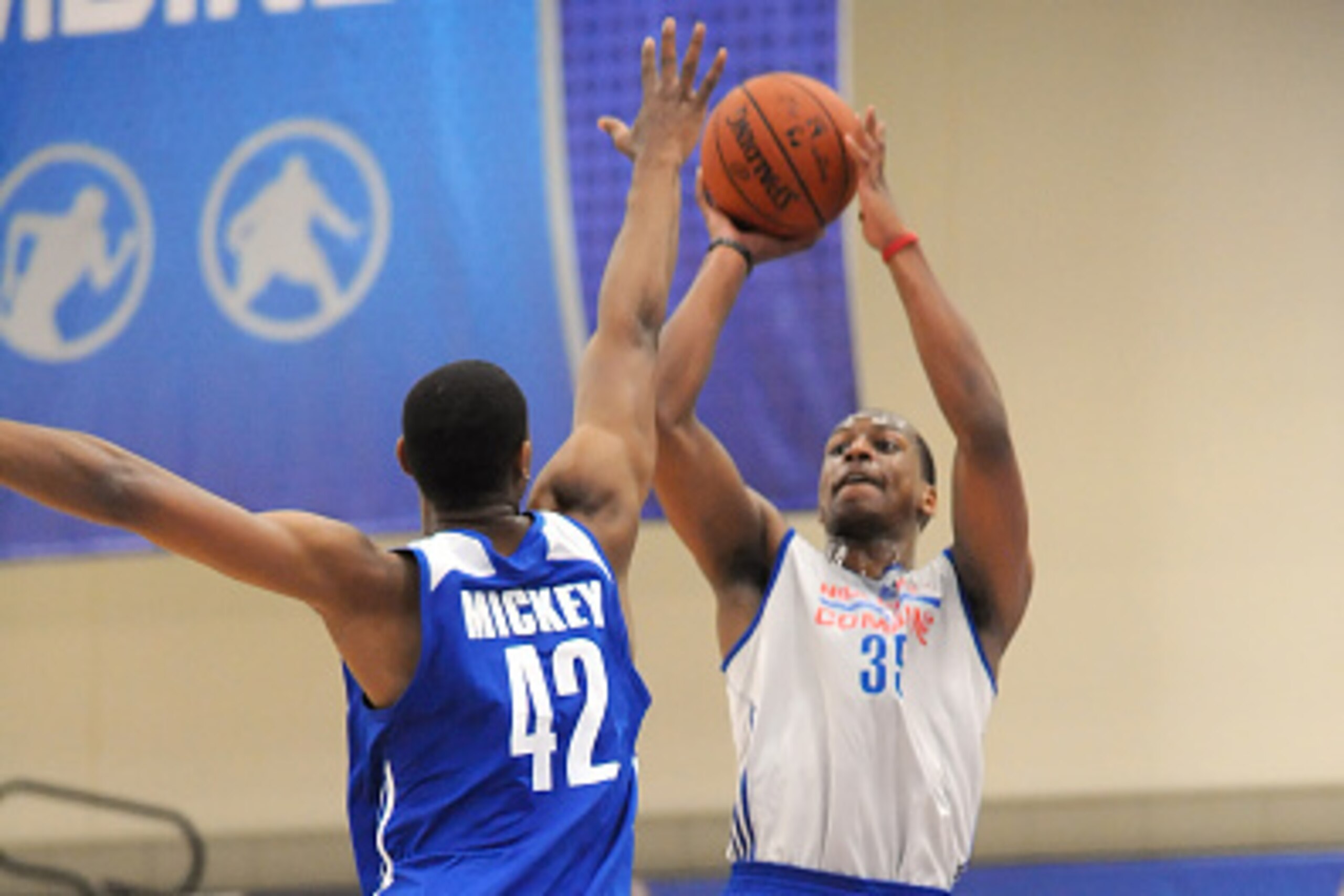 CHICAGO, IL - MAY 14: Jonathan Holmes #35 shoots the ball over Jordan Mickey #42 during the 2015 NBA Draft Combine on May 14, 2015 at Quest Multiplex in Chicago, Illinois. NOTE TO USER: User expressly acknowledges and agrees that, by downloading and/or u CHICAGO, IL - MAY 14: Jonathan Holmes #35 shoots the ball over Jordan Mickey #42 during the 2015 NBA Draft Combine on May 14, 2015 at Quest Multiplex in Chicago, Illinois. NOTE TO USER: User expressly acknowledges and agrees that, by downloading and/or u