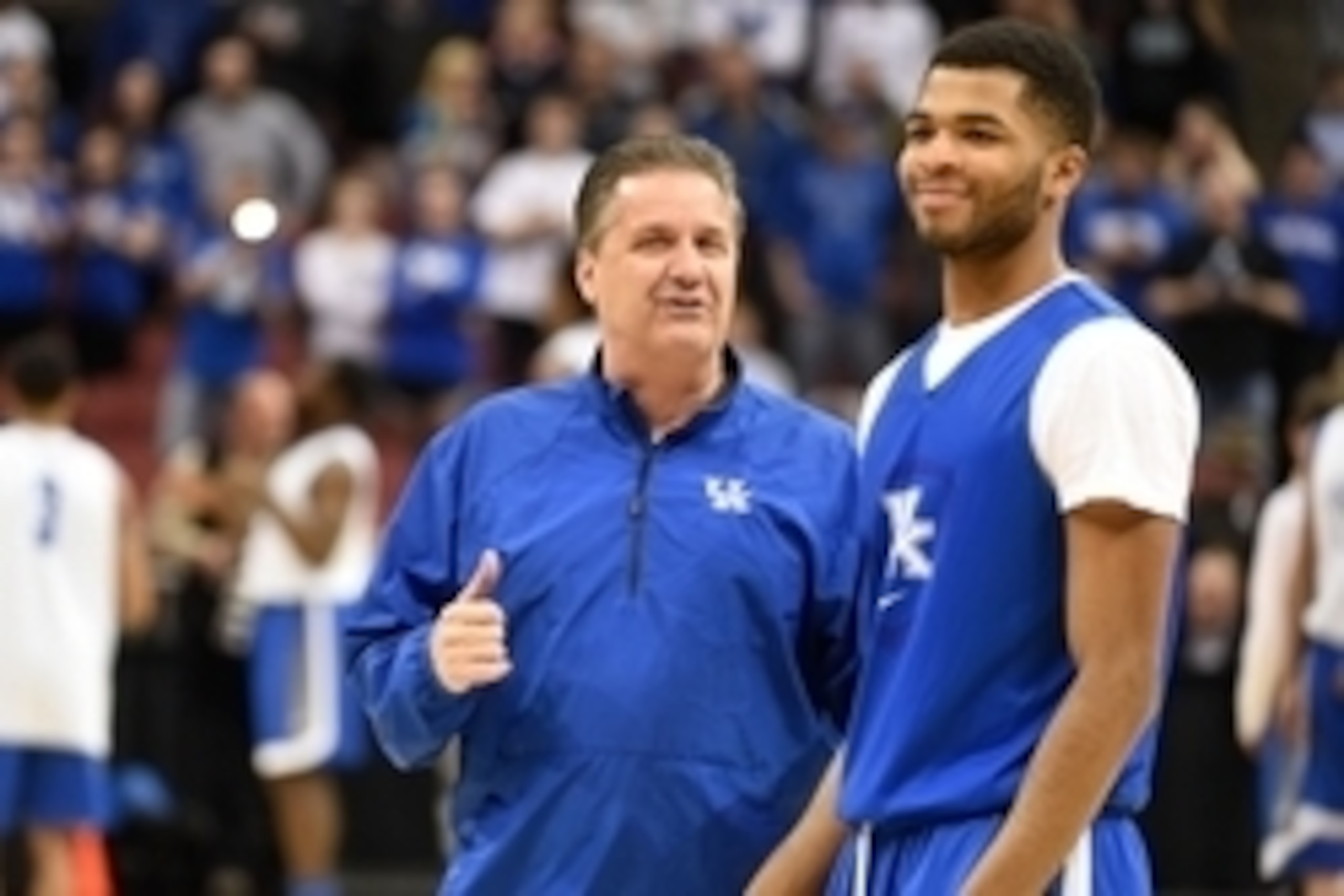 Mar 18, 2015; Louisville, KY, USA; Kentucky Wildcats head coach John Calipari talks to Kentucky Wildcats guard Andrew Harrison (5) during practice before the second round of the 2015 NCAA Tournament at KFC Yum! Center. Mandatory Credit: Jamie Rhodes-USA T