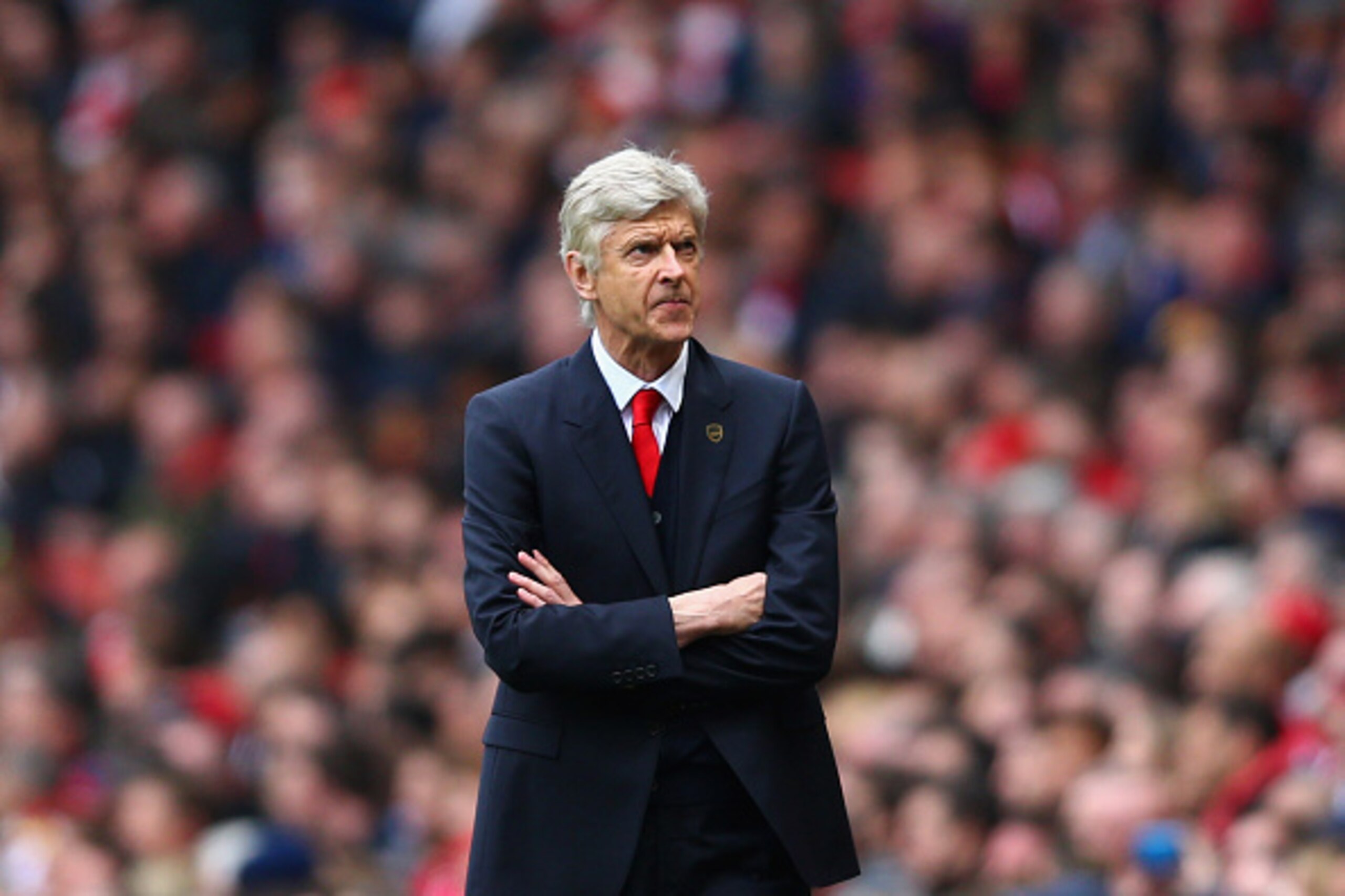 LONDON, ENGLAND - APRIL 26:  Arsene Wenger manager of Arsenal looks thoughtful during the Barclays Premier League match between Arsenal and Chelsea at Emirates Stadium on April 26, 2015 in London, England.  (Photo by Paul Gilham/Getty Images)