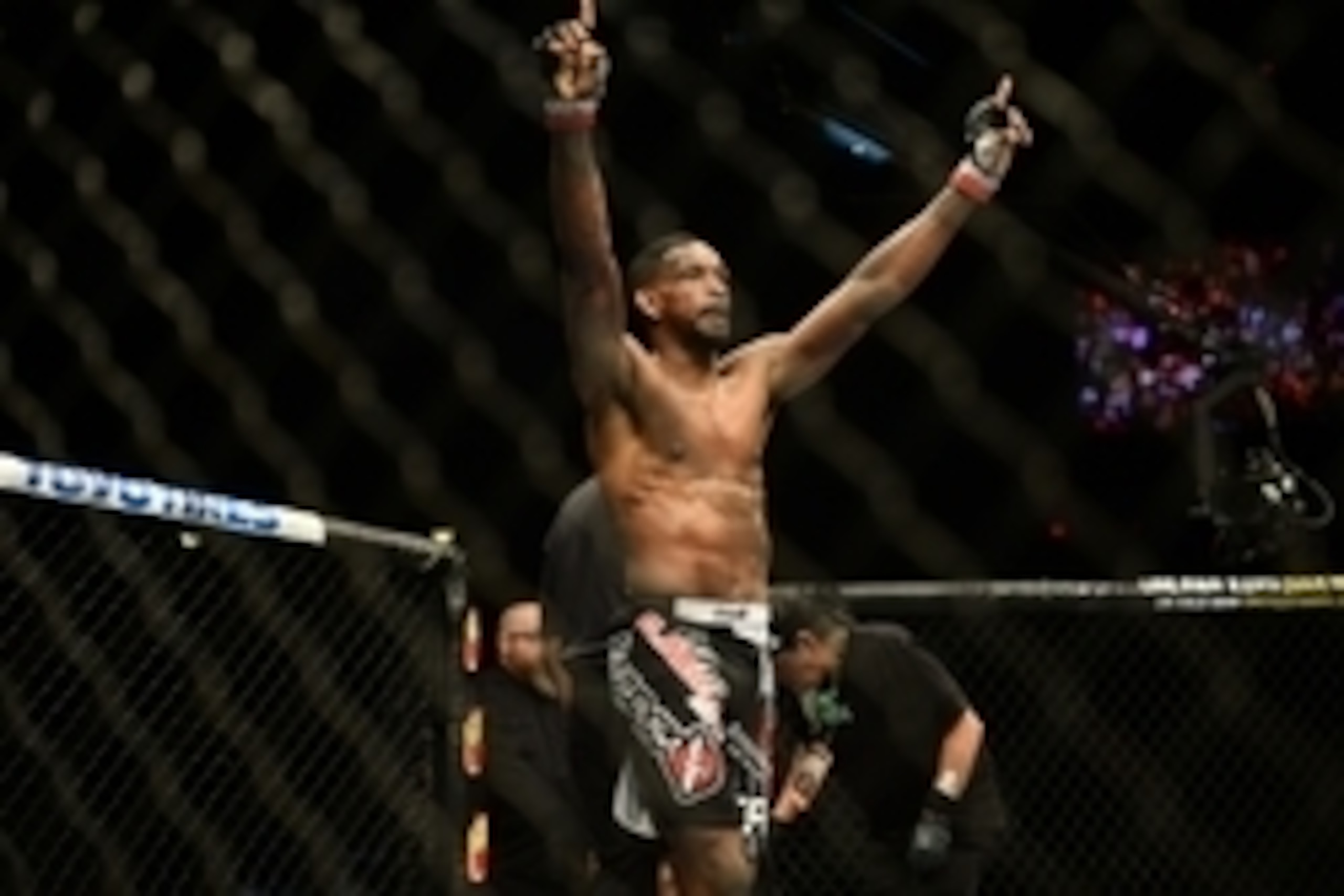Feb 14, 2015; Broomfield, CO, USA; Neil Magny (red) celebrates his win over Kiichi Kunimoto (not pictured) during the UFC Fight Night at the 1stBANK Center. Mandatory Credit: Ron Chenoy-USA TODAY Sports