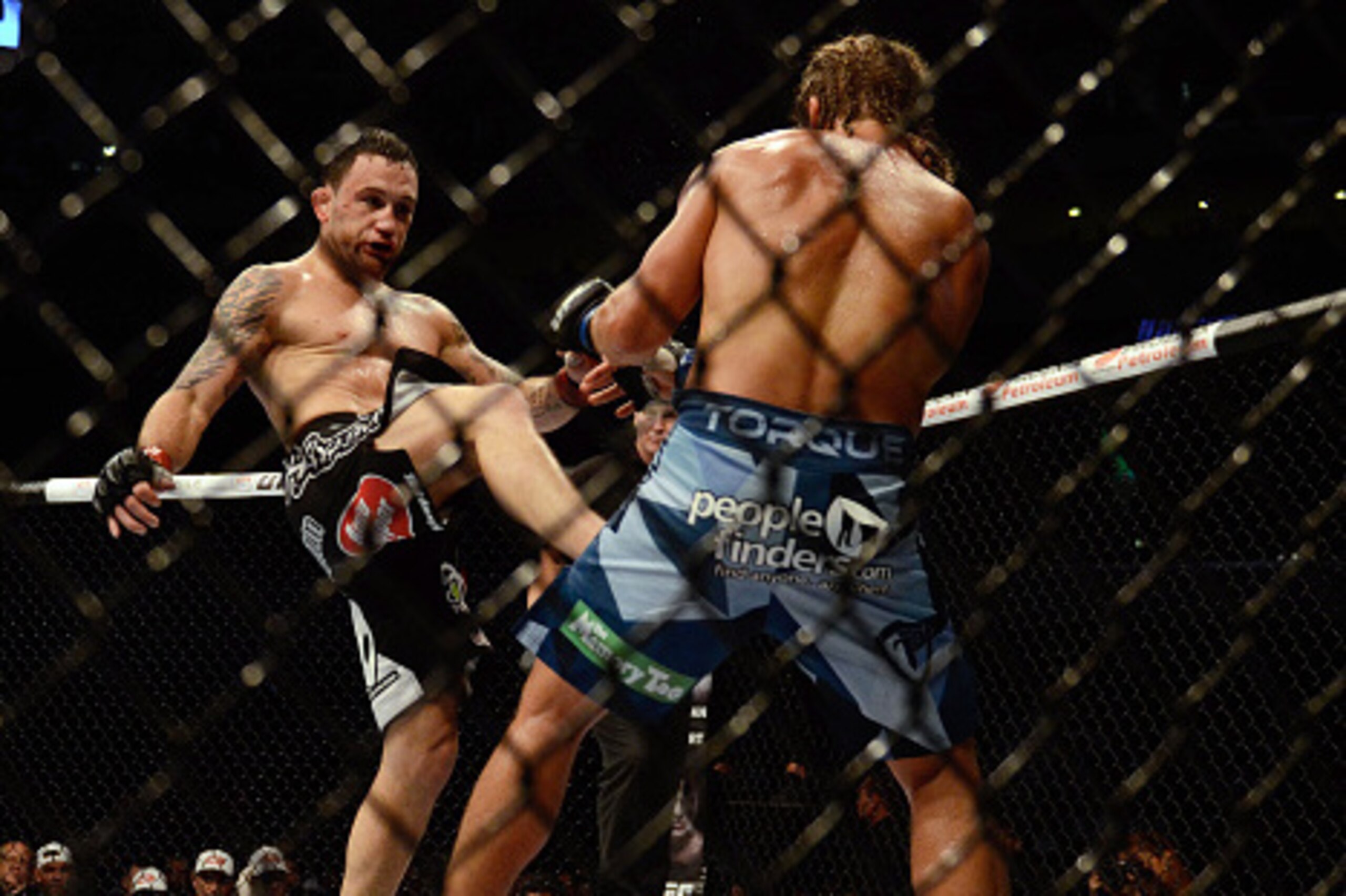 MANILA, PHILIPPINES - MAY 16: Uriah Faber grapples with Frankie Edgar in their featherweight bout during the UFC Fight Night event at the Mall Of Asia Arena on May 16, 2015 in Manila, Philippines. (Photo by Dondi Tawatao/Getty Images) MANILA, PHILIPPINES - MAY 16: Uriah Faber grapples with Frankie Edgar in their featherweight bout during the UFC Fight Night event at the Mall Of Asia Arena on May 16, 2015 in Manila, Philippines. (Photo by Dondi Tawatao/Getty Images)