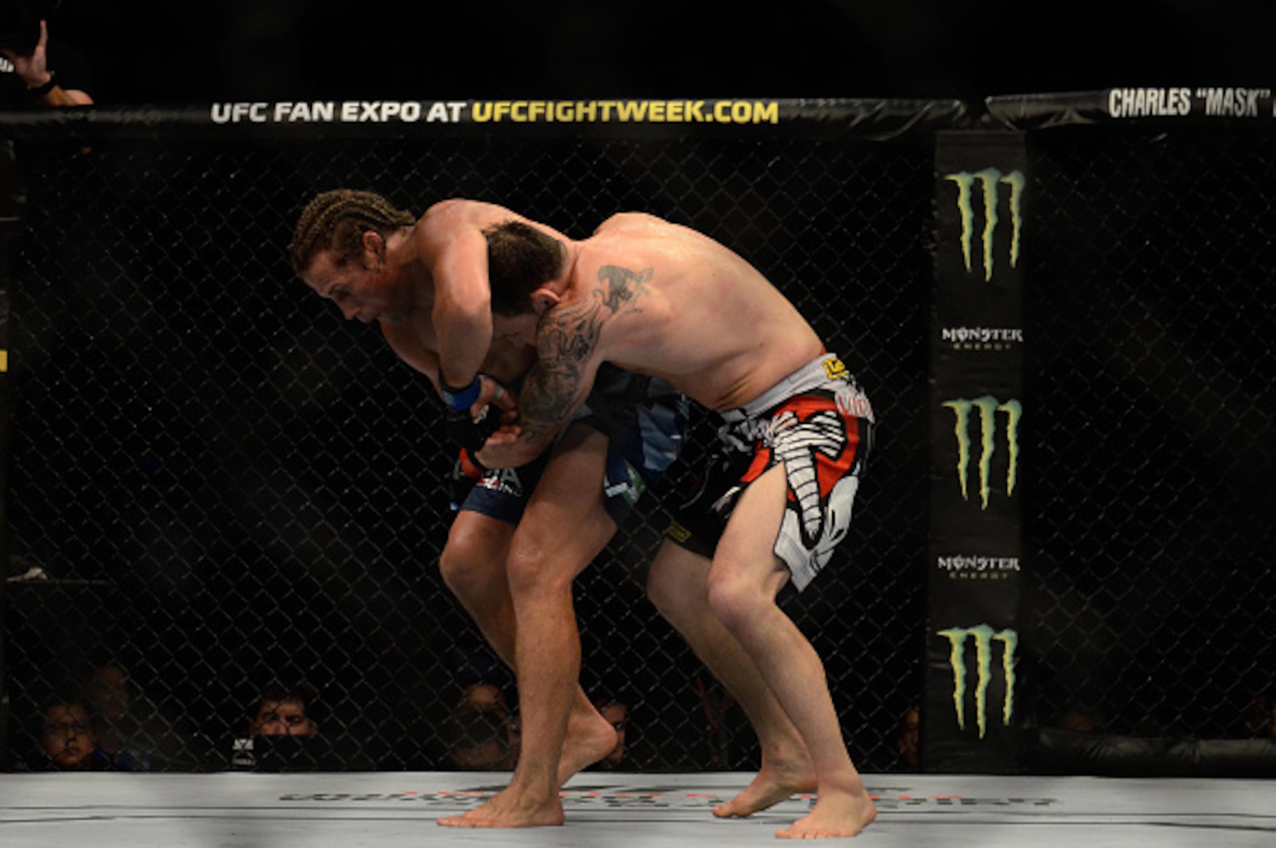 MANILA, PHILIPPINES - MAY 16: Uriah Faber grapples with Frankie Edgar in their featherweight bout during the UFC Fight Night event at the Mall Of Asia Arena on May 16, 2015 in Manila, Philippines. (Photo by Dondi Tawatao/Getty Images) MANILA, PHILIPPINES - MAY 16: Uriah Faber grapples with Frankie Edgar in their featherweight bout during the UFC Fight Night event at the Mall Of Asia Arena on May 16, 2015 in Manila, Philippines. (Photo by Dondi Tawatao/Getty Images)