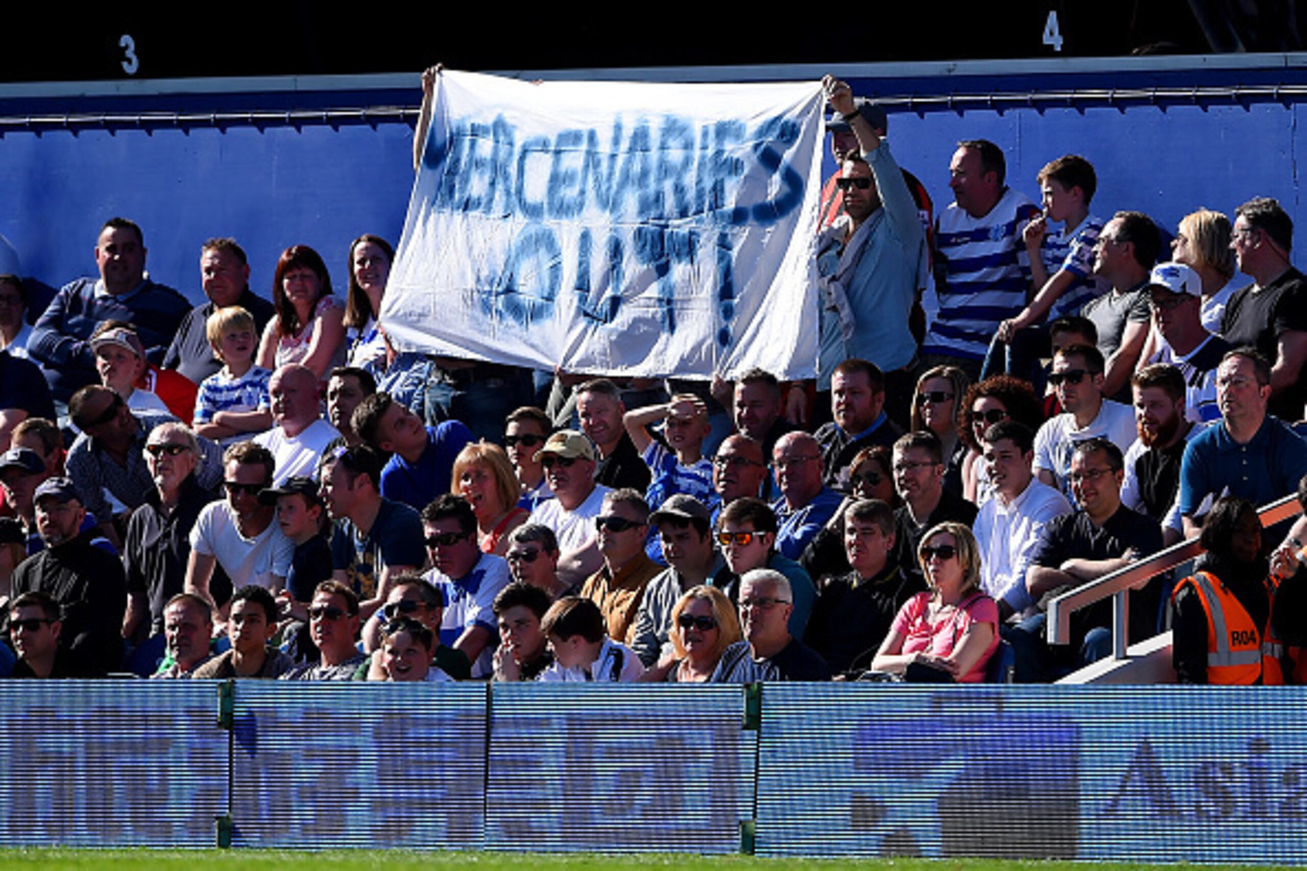 LONDON, ENGLAND - MAY 16: QPR fans hold up a banner during the Barclays Premier League match between Queens Park Rangers and Newcastle United at Loftus Road on May 16, 2015 in London, England. (Photo by Shaun Botterill/Getty Images) LONDON, ENGLAND - MAY 16: QPR fans hold up a banner during the Barclays Premier League match between Queens Park Rangers and Newcastle United at Loftus Road on May 16, 2015 in London, England. (Photo by Shaun Botterill/Getty Images)