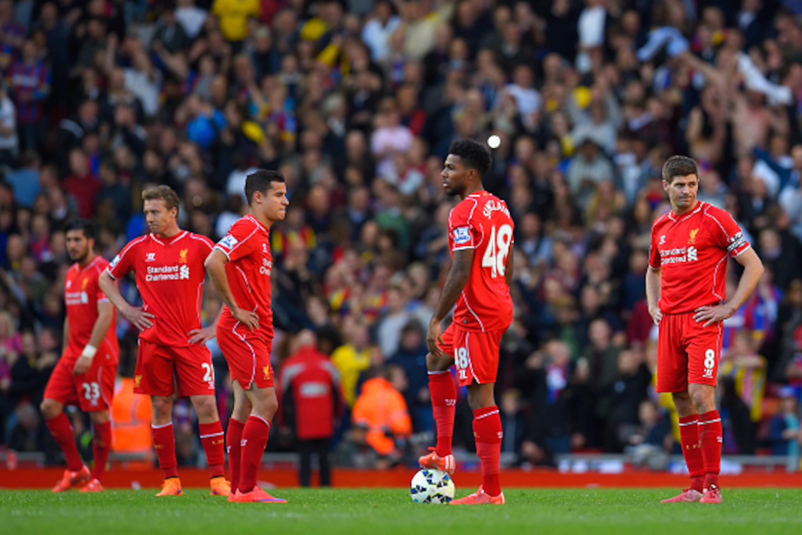 LIVERPOOL, ENGLAND - MAY 16:  A dejected Steven Gerrard of Liverpool (R) looks on after Liverpool conceded a third goal during the Barclays Premier League match between Liverpool and Crystal Palace at Anfield on May 16, 2015 in Liverpool, England.  (Photo