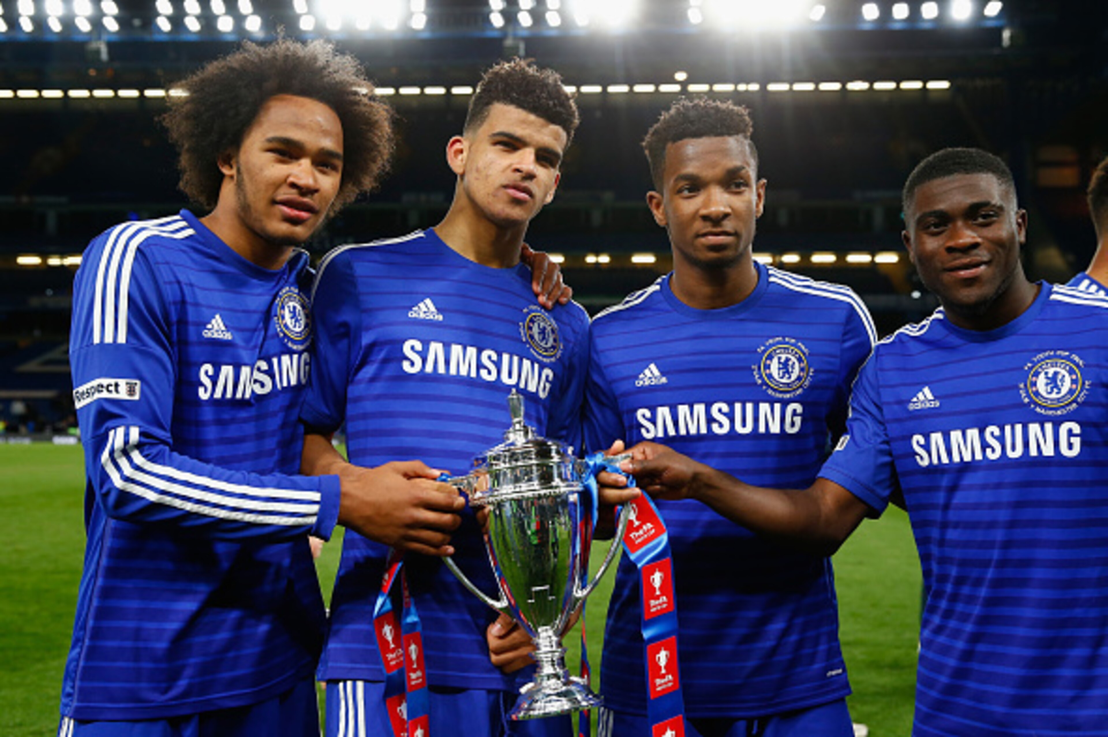 LONDON, ENGLAND - APRIL 27:  (L-R) Isaiah Brown, Dominic Solanke, Kasey Palmer and Jeremie Boga of Chelsea with the winners trophy during the FA Youth Cup Final second leg match between Chelsea and Manchester City at Stamford Bridge on April 27, 2015 in L