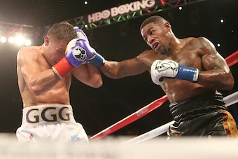 INGLEWOOD, CA - MAY 16: Willie Monroe Jr. (R)throws a punch at Gennady Golovkin in their World Middleweight Championship fight at The Forum on May 16, 2015 in Inglewood, California  Golovkin won in a TKO in the sixth round.  (Photo by Stephen Dunn/Getty I