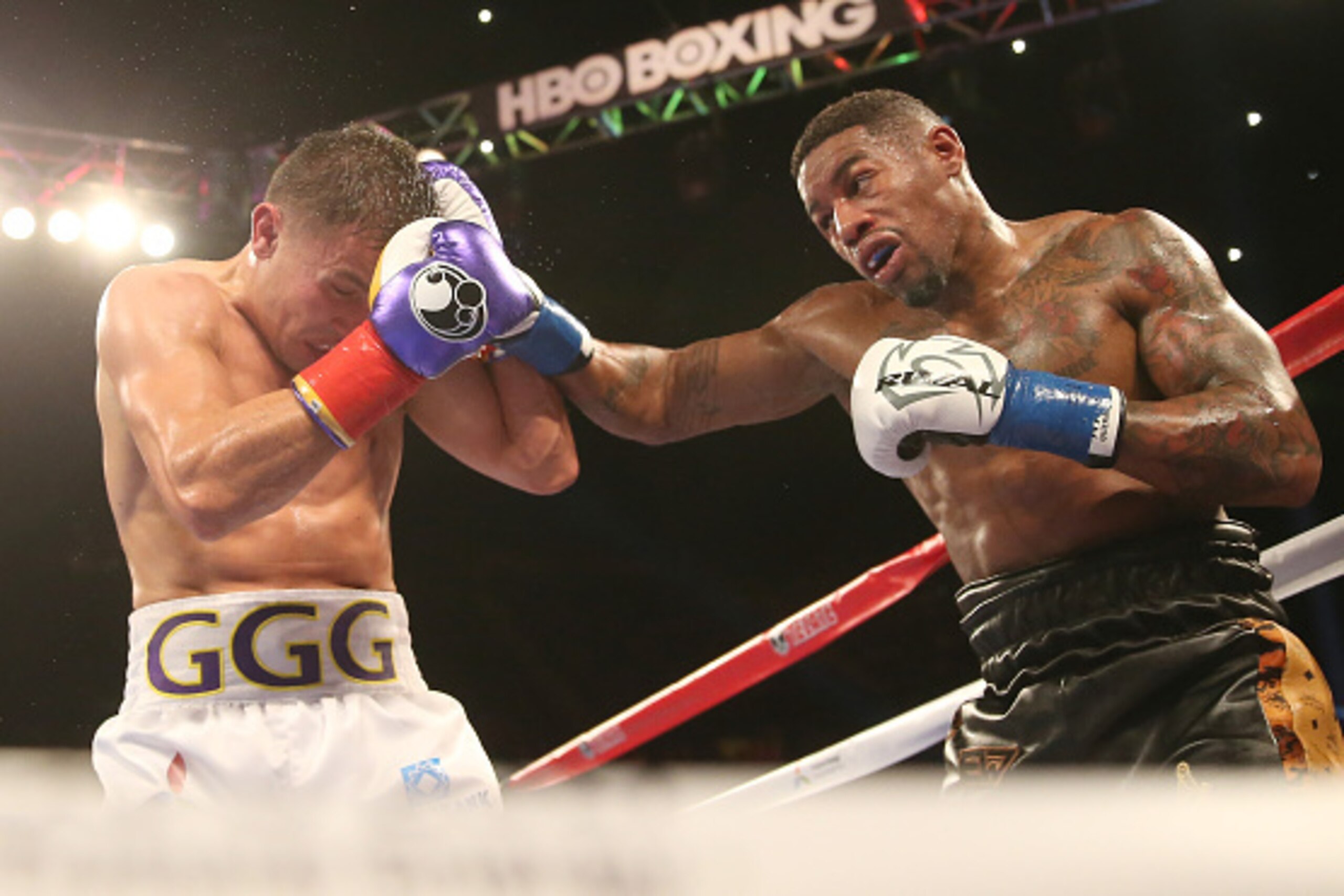 INGLEWOOD, CA - MAY 16: Willie Monroe Jr. (R)throws a punch at Gennady Golovkin in their World Middleweight Championship fight at The Forum on May 16, 2015 in Inglewood, California  Golovkin won in a TKO in the sixth round.  (Photo by Stephen Dunn/Getty I
