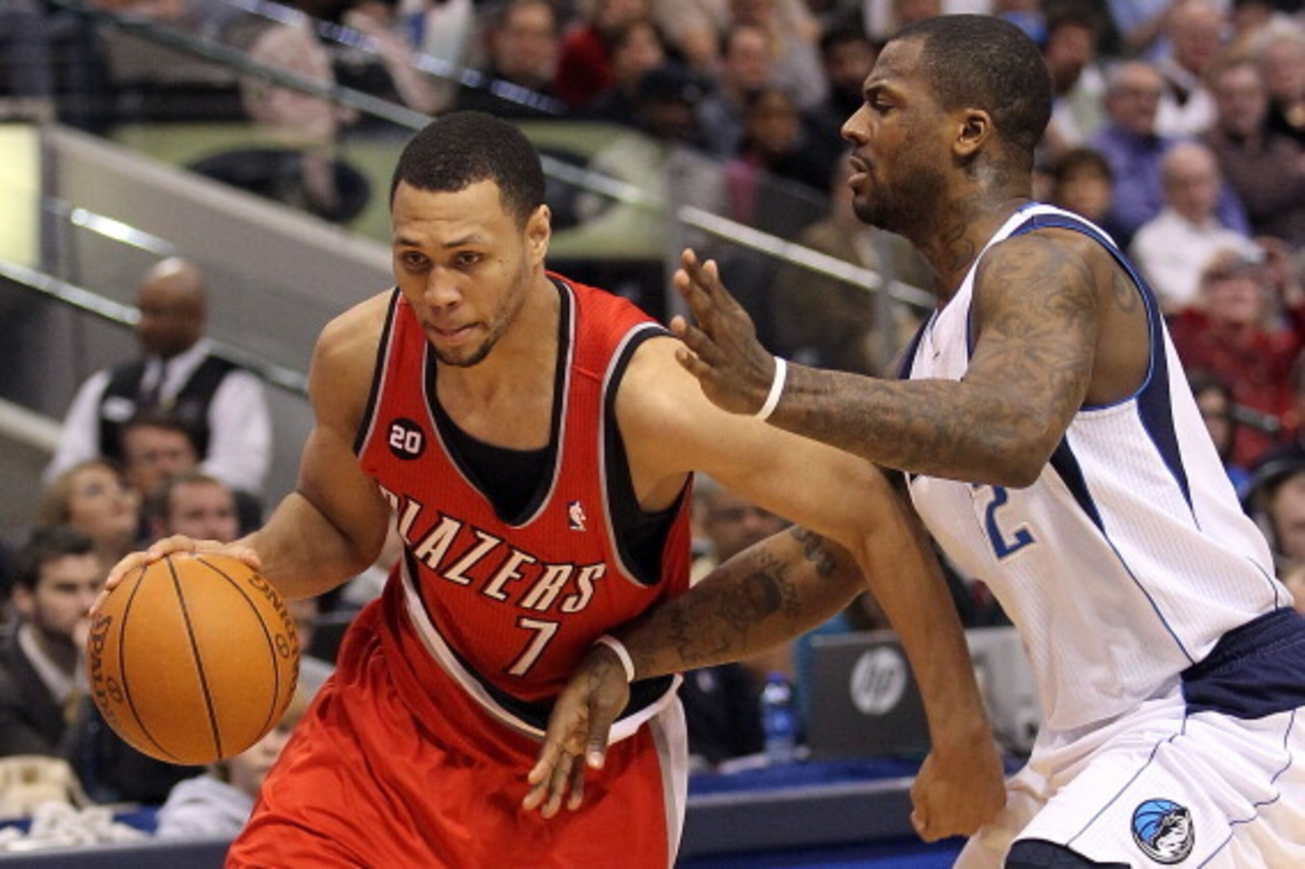 DALLAS, TX - DECEMBER 15:  Guard Brandon Roy #7 of the Portland Trail Blazers dribbles the ball past DeShawn Stevenson #2 of the Dallas Mavericks at American Airlines Center on December 15, 2010 in Dallas, Texas.  NOTE TO USER: User expressly acknowledges