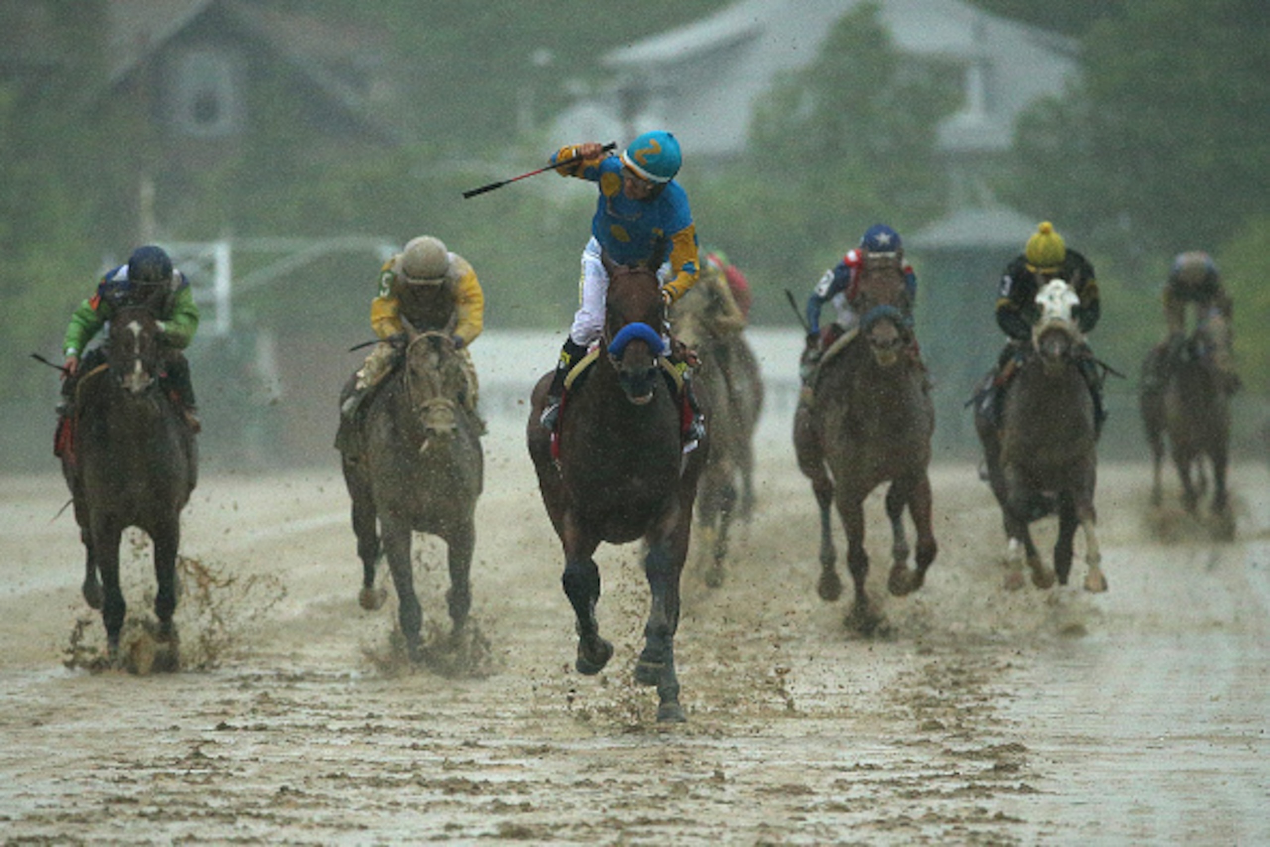 BALTIMORE, MD - MAY 16: American Pharoah #1 ridden by Victor Espinoza crosses the finish line to win the 140th running of the Preakness Stakes at Pimlico Race Course on May 16, 2015 in Baltimore, Maryland. (Photo by Patrick Smith/Getty Images) BALTIMORE, MD - MAY 16: American Pharoah #1 ridden by Victor Espinoza crosses the finish line to win the 140th running of the Preakness Stakes at Pimlico Race Course on May 16, 2015 in Baltimore, Maryland. (Photo by Patrick Smith/Getty Images)