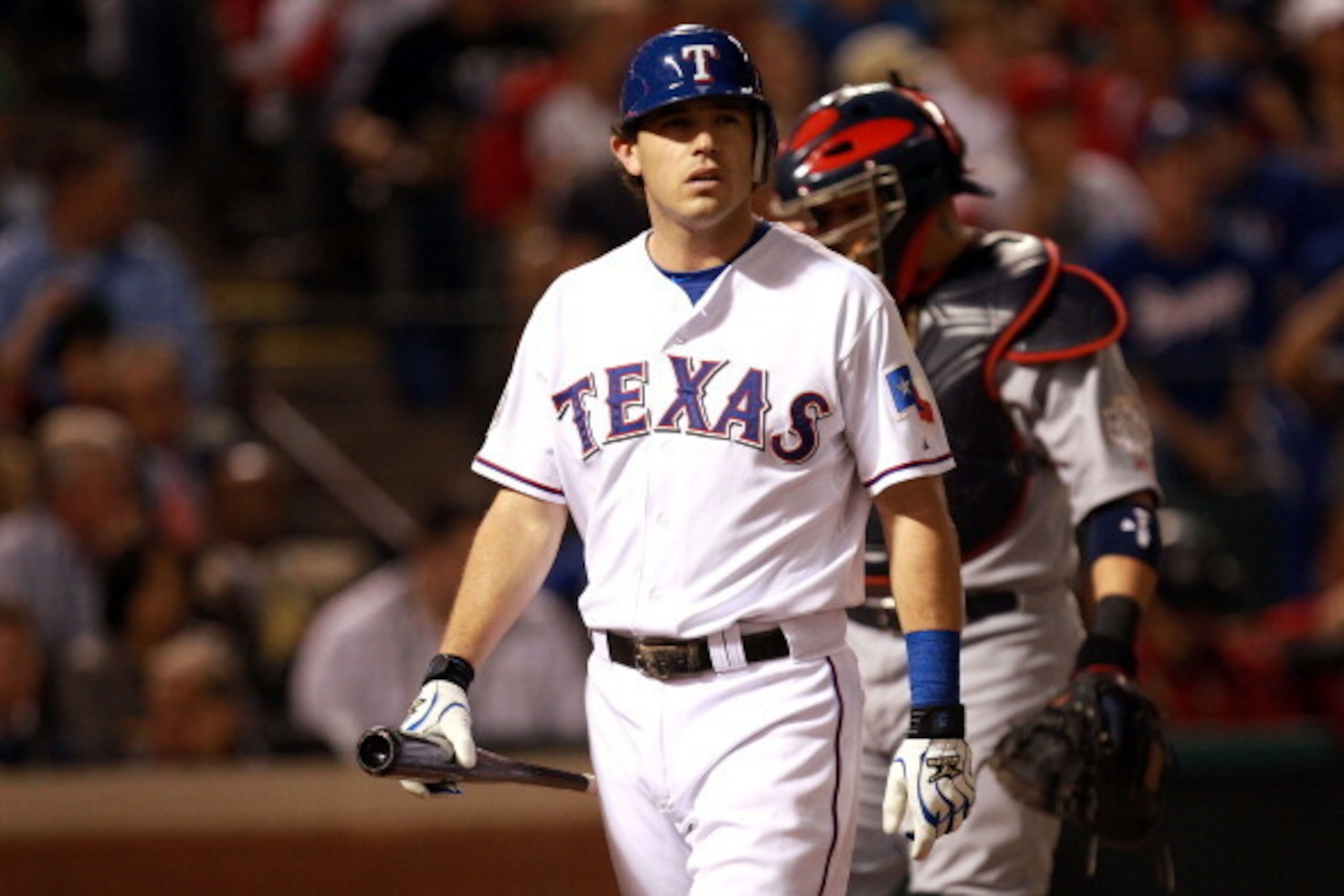 ARLINGTON, TX - OCTOBER 22: Ian Kinsler #5 of the Texas Rangers reacts after striking out in the first inning during Game Three of the MLB World Series against the St. Louis Cardinals at Rangers Ballpark in Arlington on October 22, 2011 in Arlington, Tex ARLINGTON, TX - OCTOBER 22: Ian Kinsler #5 of the Texas Rangers reacts after striking out in the first inning during Game Three of the MLB World Series against the St. Louis Cardinals at Rangers Ballpark in Arlington on October 22, 2011 in Arlington, Tex