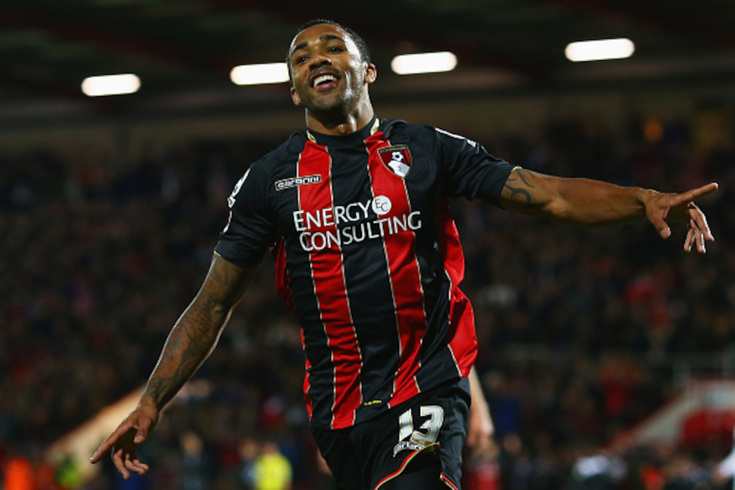 BOURNEMOUTH, ENGLAND - APRIL 27:  Callum Wilson of Bournemouth celebrates as he scores their third goal during the Sky Bet Championship match between AFC Bournemouth and Bolton Wanderers at Goldsands Stadium on April 27, 2015 in Bournemouth, England.  (Ph