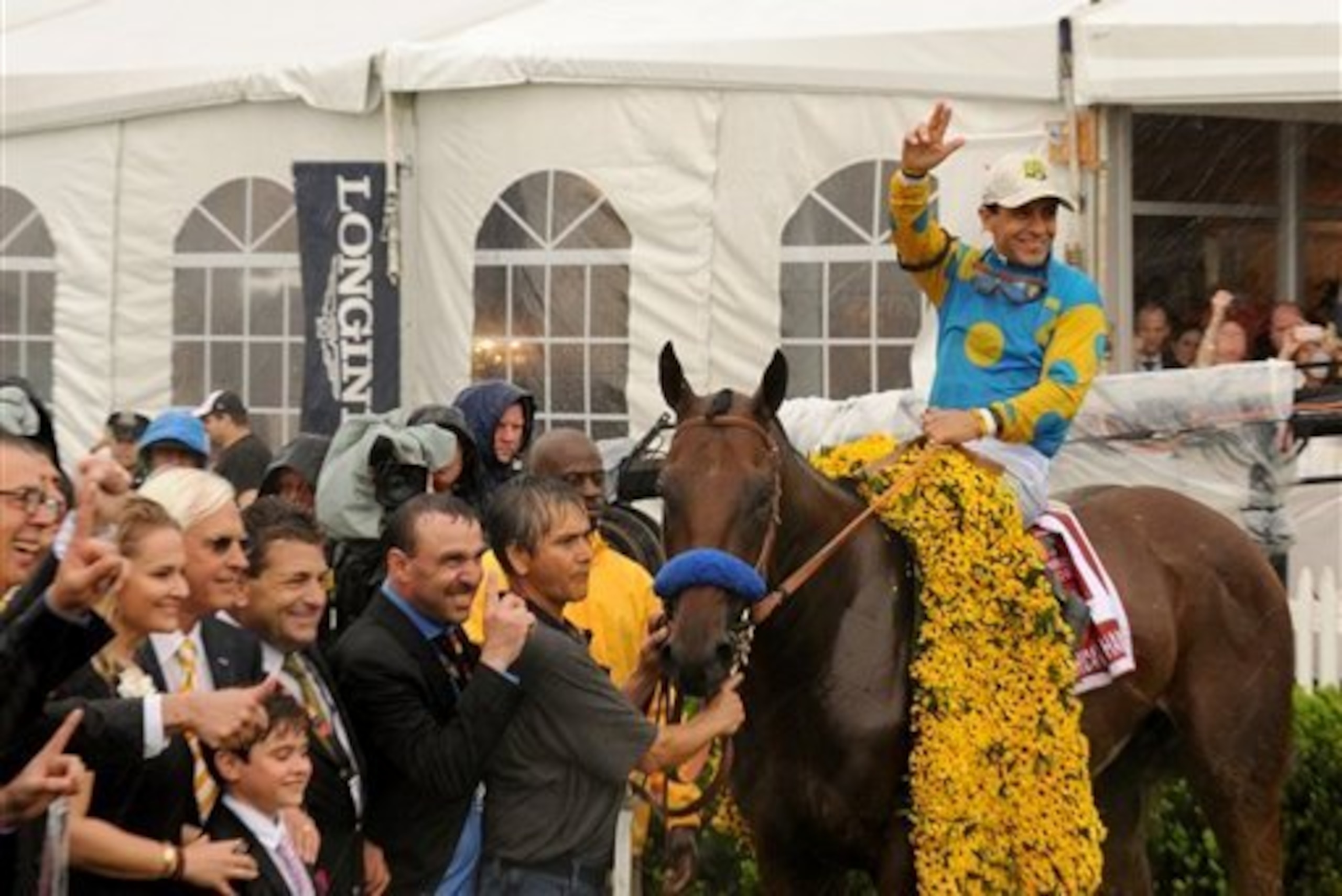 Victor Espinoza rode American Pharoah expertly in difficult conditions.