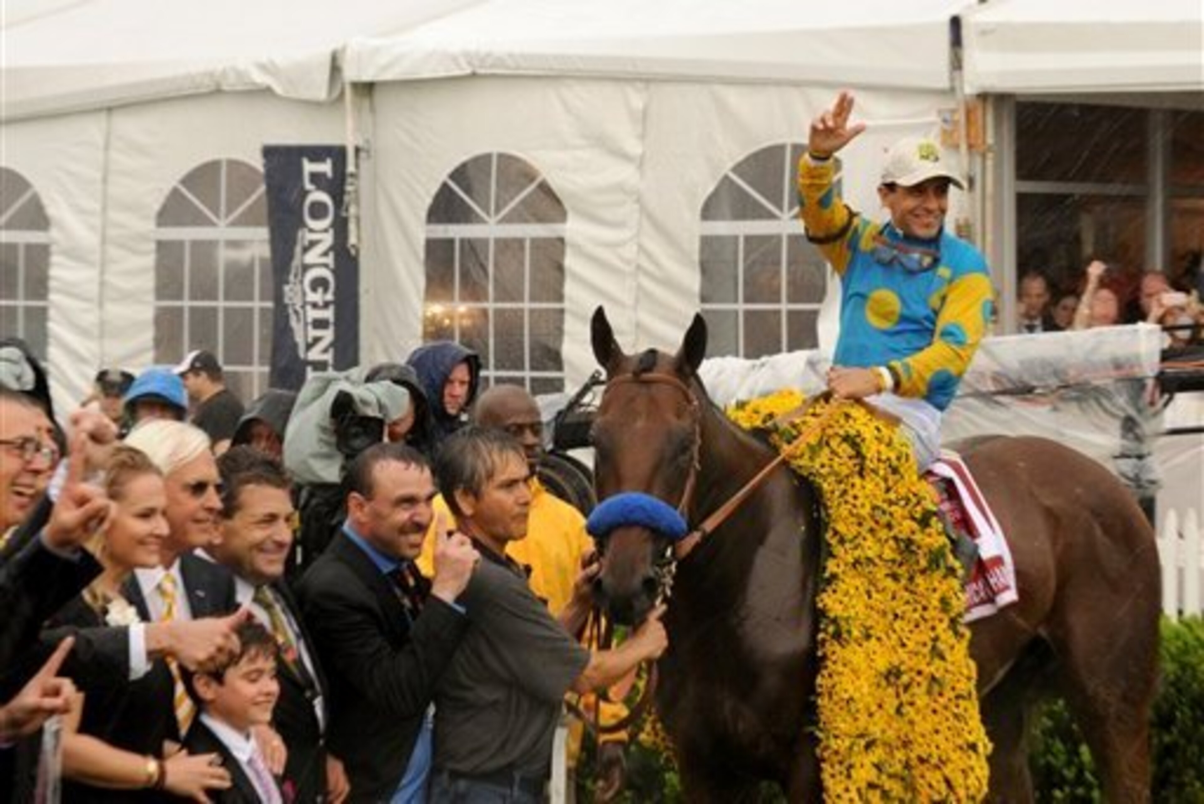 Victor Espinoza rode American Pharoah expertly in difficult conditions.