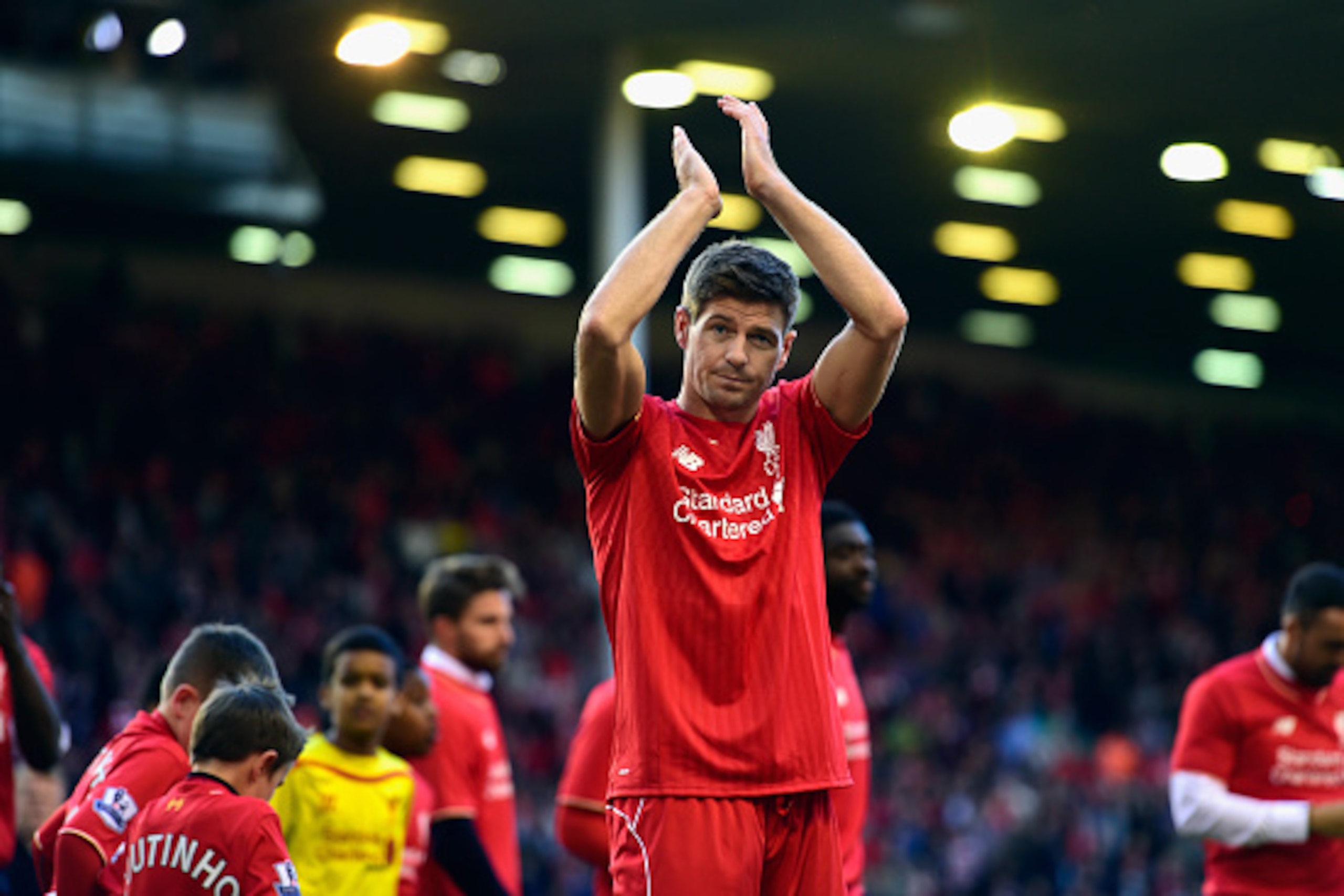 LIVERPOOL, ENGLAND - MAY 16:  Steven Gerrard of Liverpool applauds the Kop end after he Barclays Premier League match betrween Liverpool and Crystal Palace at Anfield on May 16, 2015 in Liverpool, England.  (Photo by Stu Forster/Getty Images)