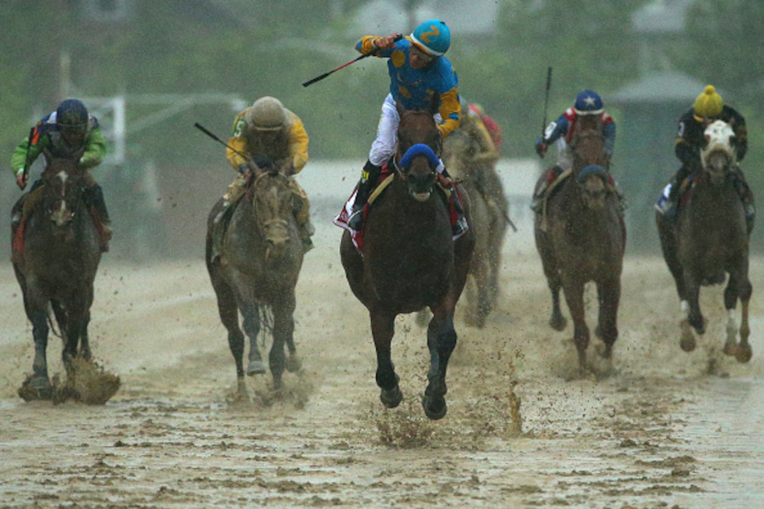 BALTIMORE, MD - MAY 16:  American Pharoah #1 ridden by Victor Espinoza crosses the finish line to win the 140th running of the Preakness Stakes at Pimlico Race Course on May 16, 2015 in Baltimore, Maryland.  (Photo by Patrick Smith/Getty Images)